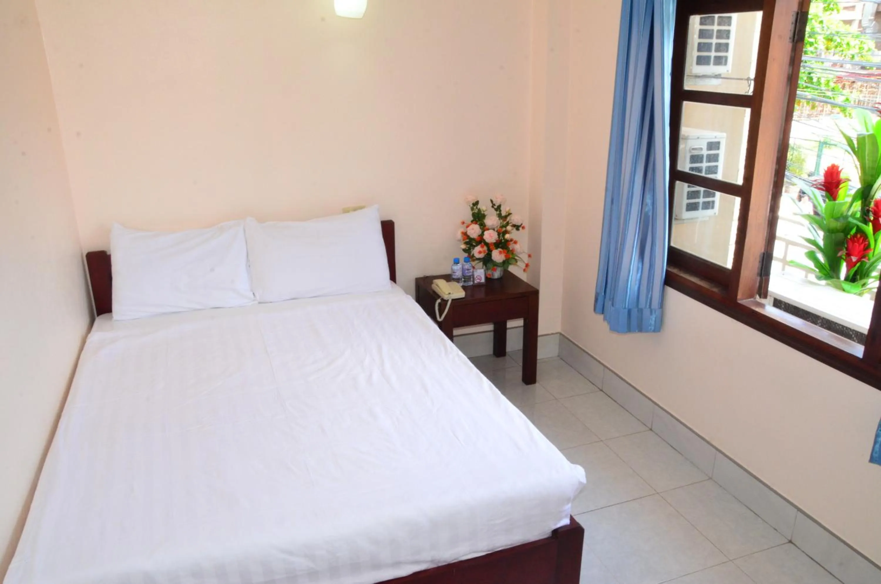 Bed in Hoang Kim Hotel