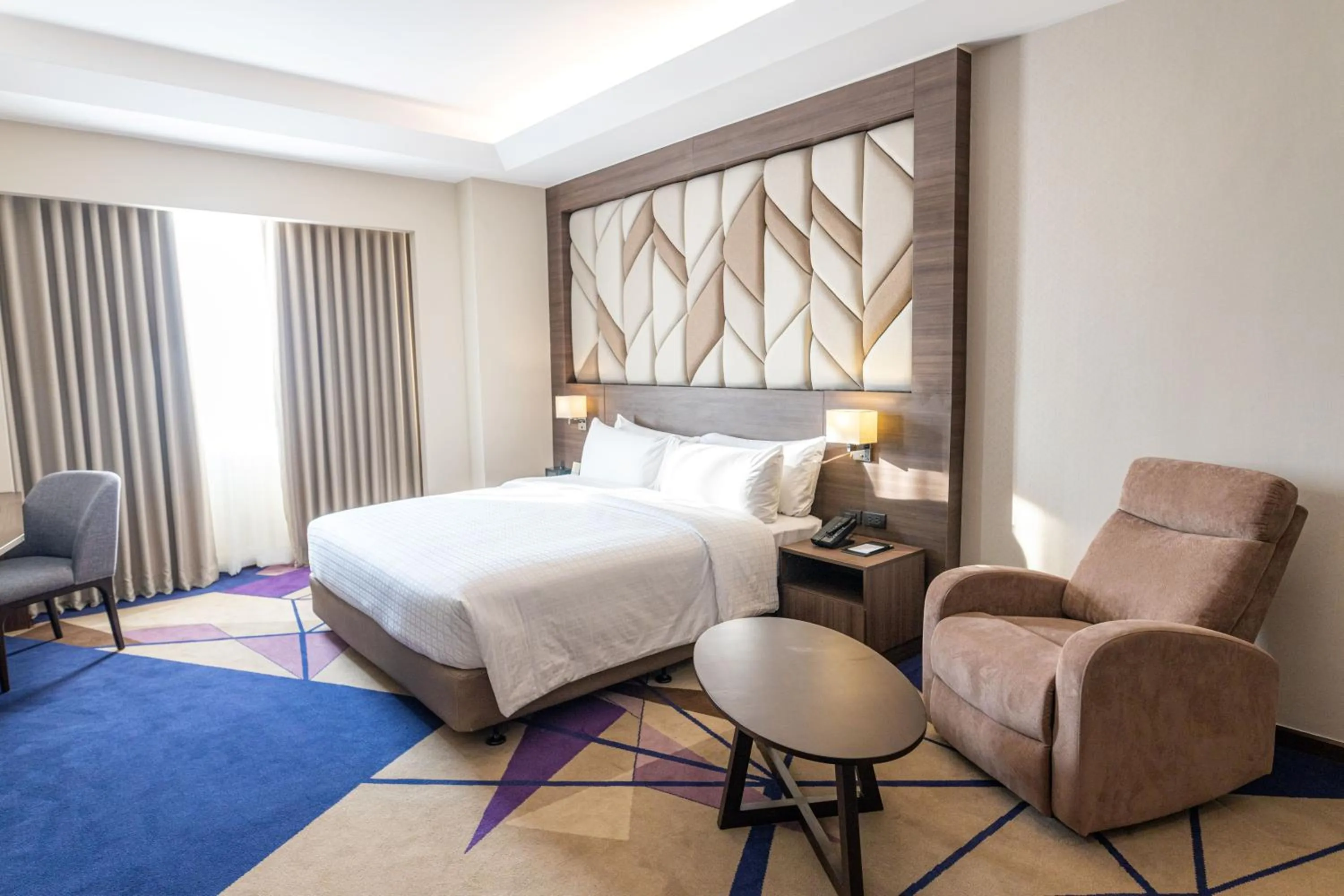 Bedroom, Bed in Luxent Hotel