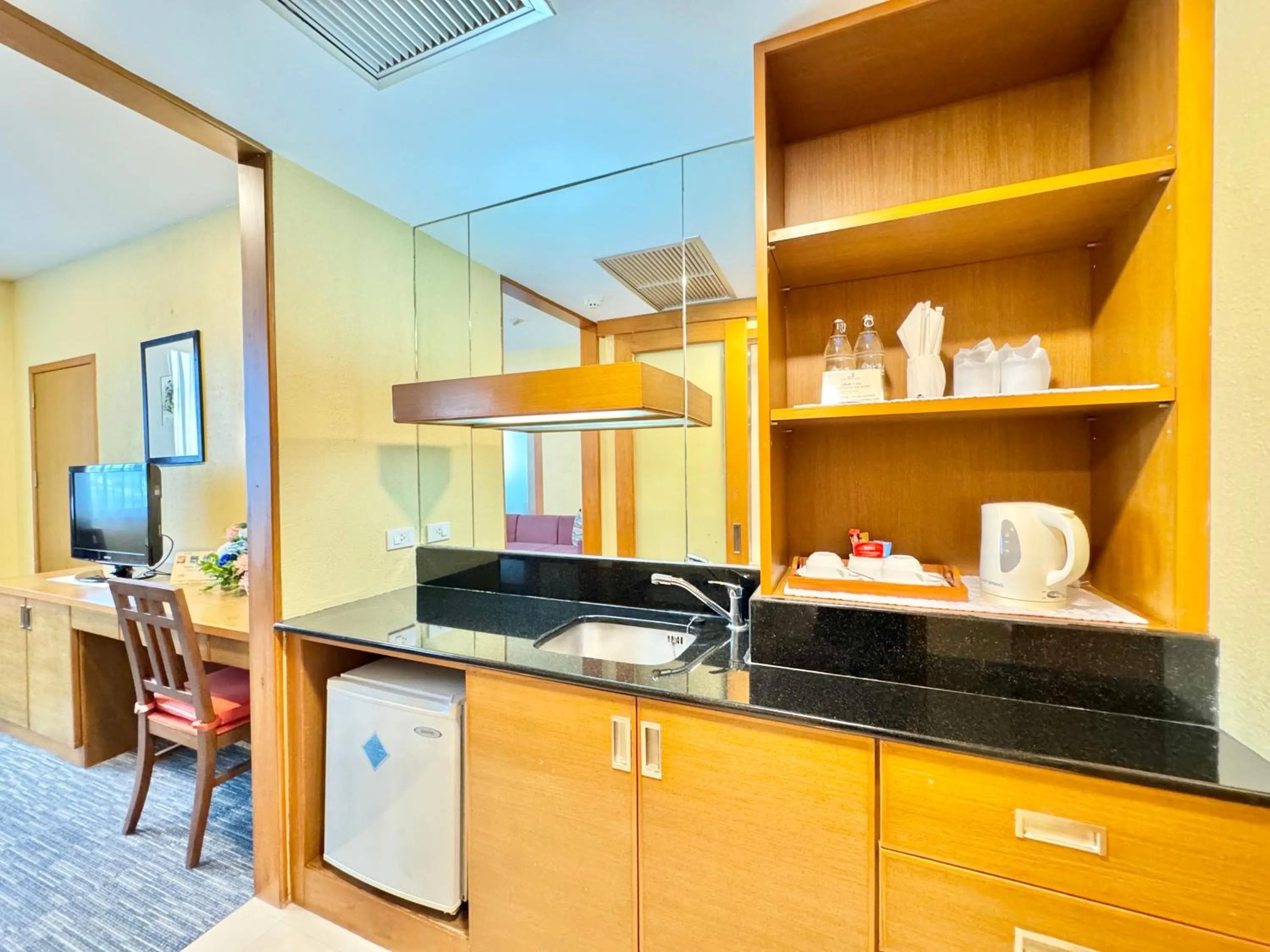 Kitchen or kitchenette in Phuket Merlin Hotel