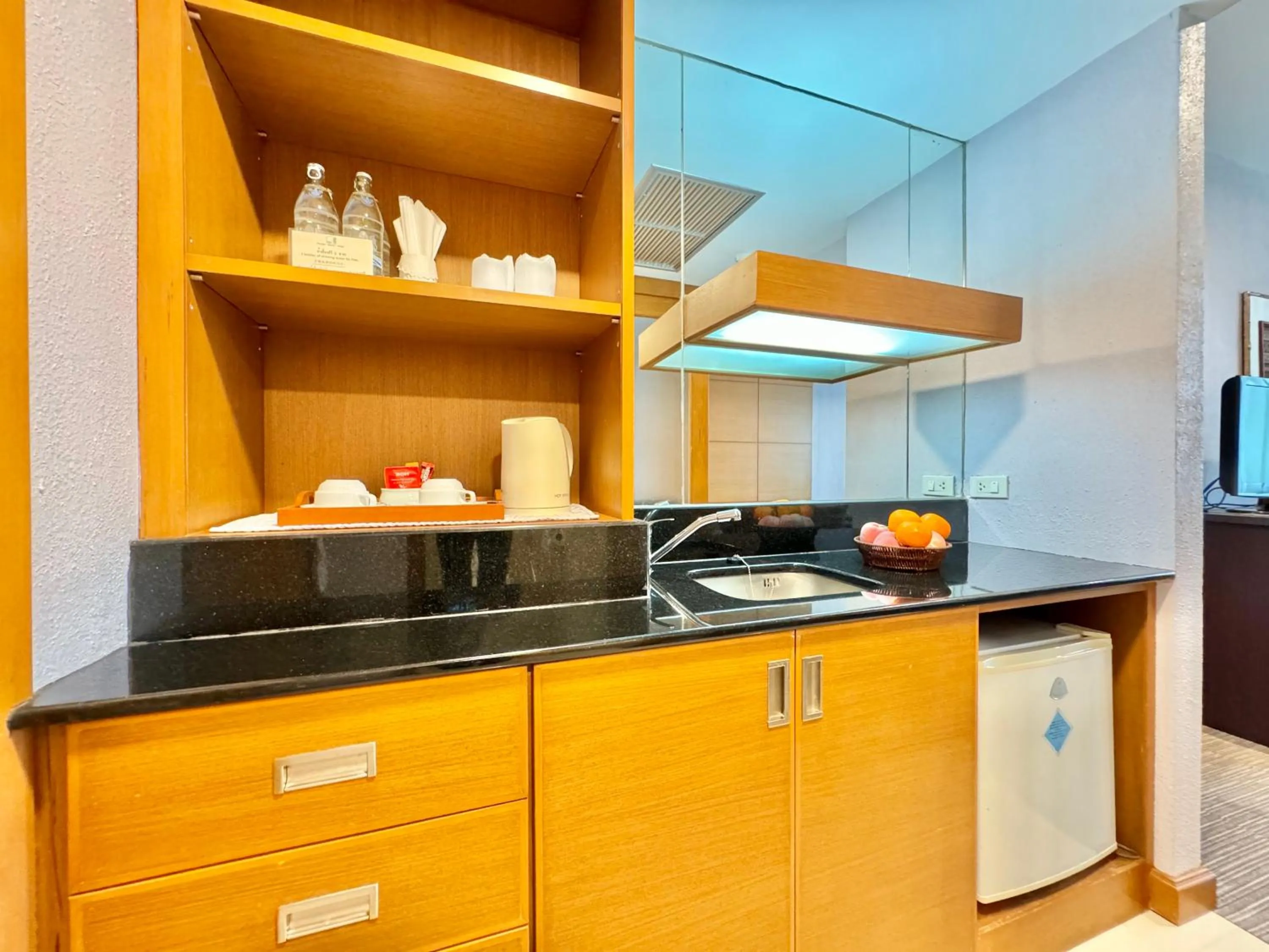 Kitchen or kitchenette in Phuket Merlin Hotel