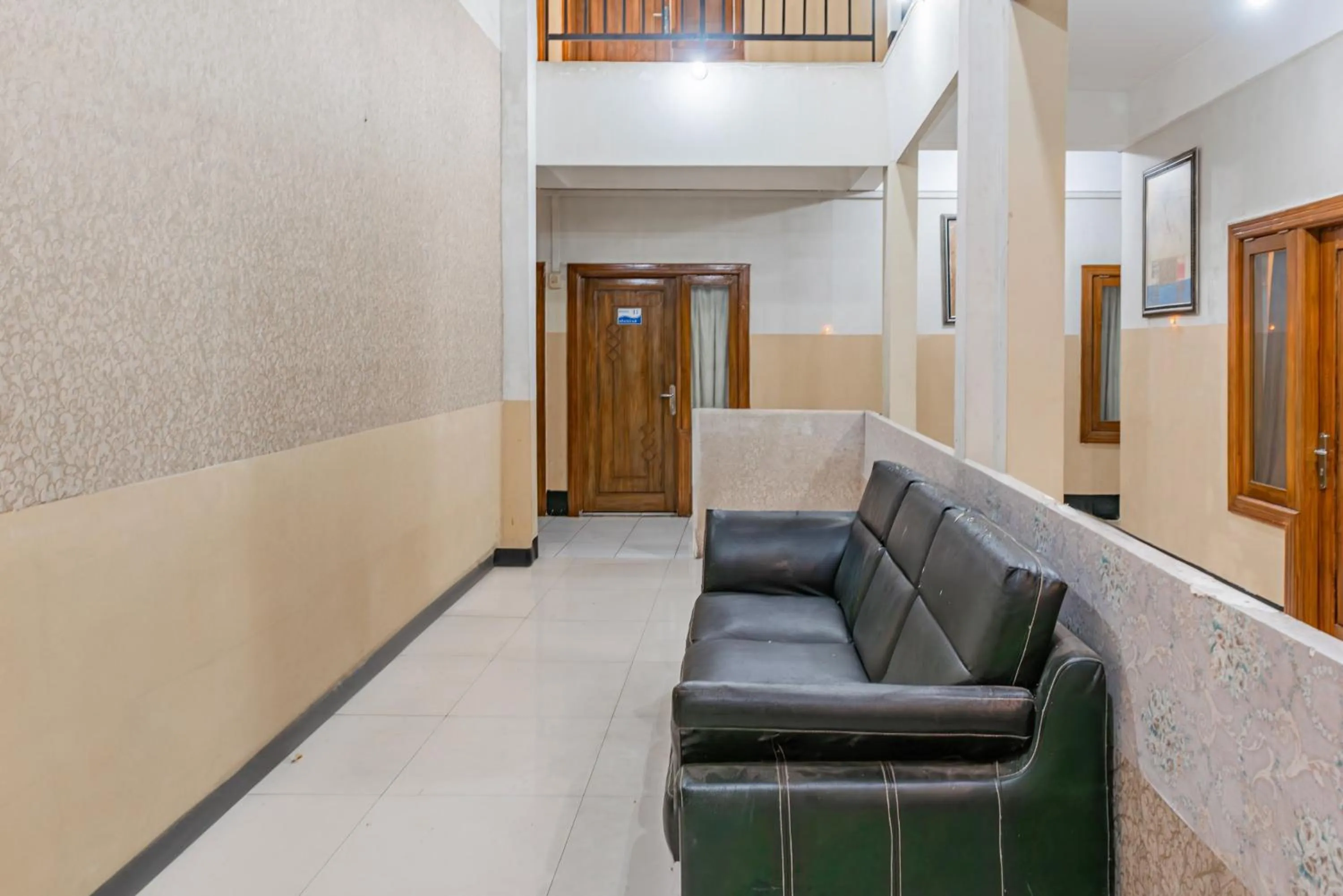 Seating area in Hotel O Ilir Barar I Near Rumah Sakit Islam Siti Khadijah Formerly Maleo Hotel