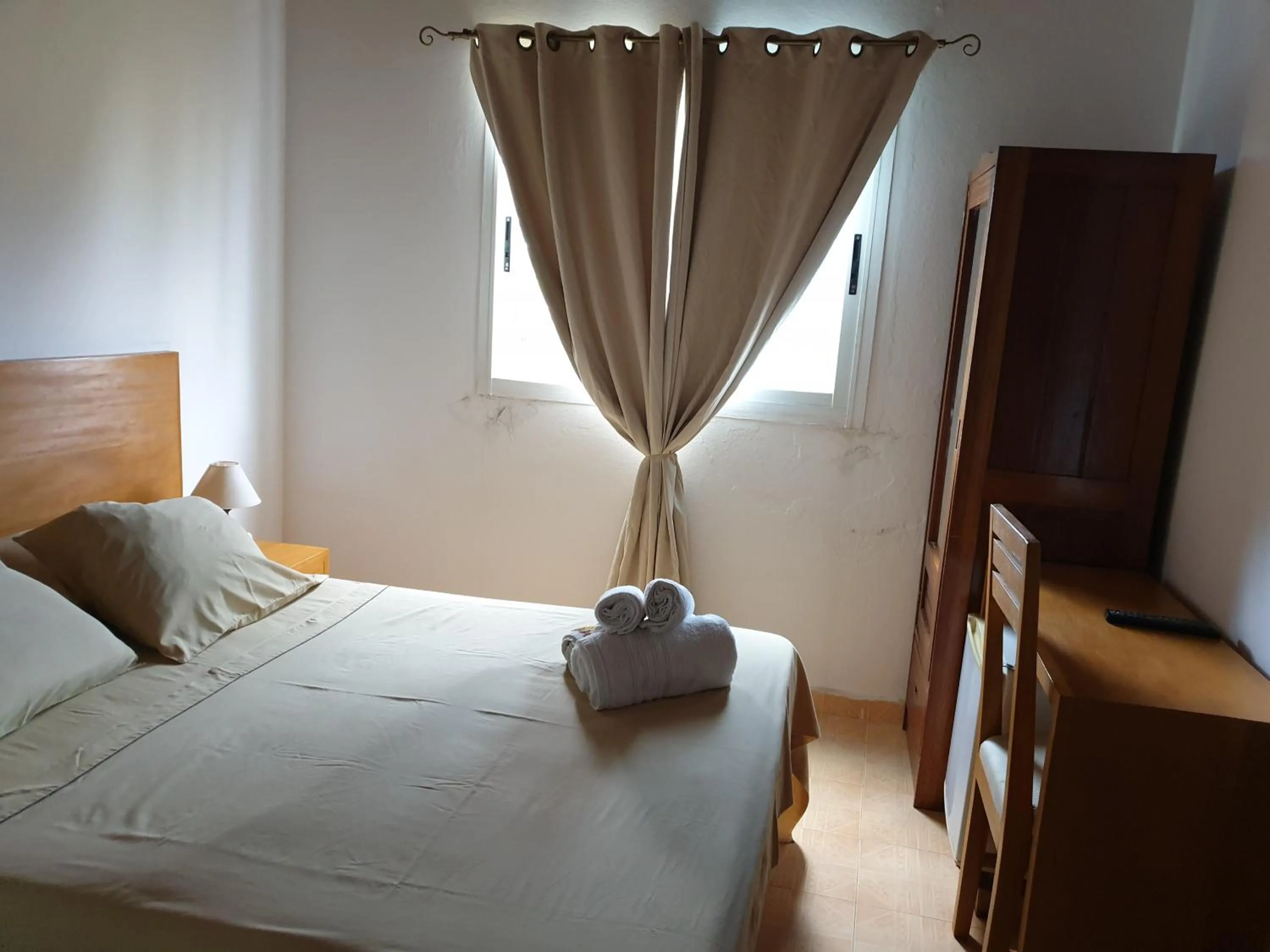 Bedroom, Bed in Residencial Mira Rio