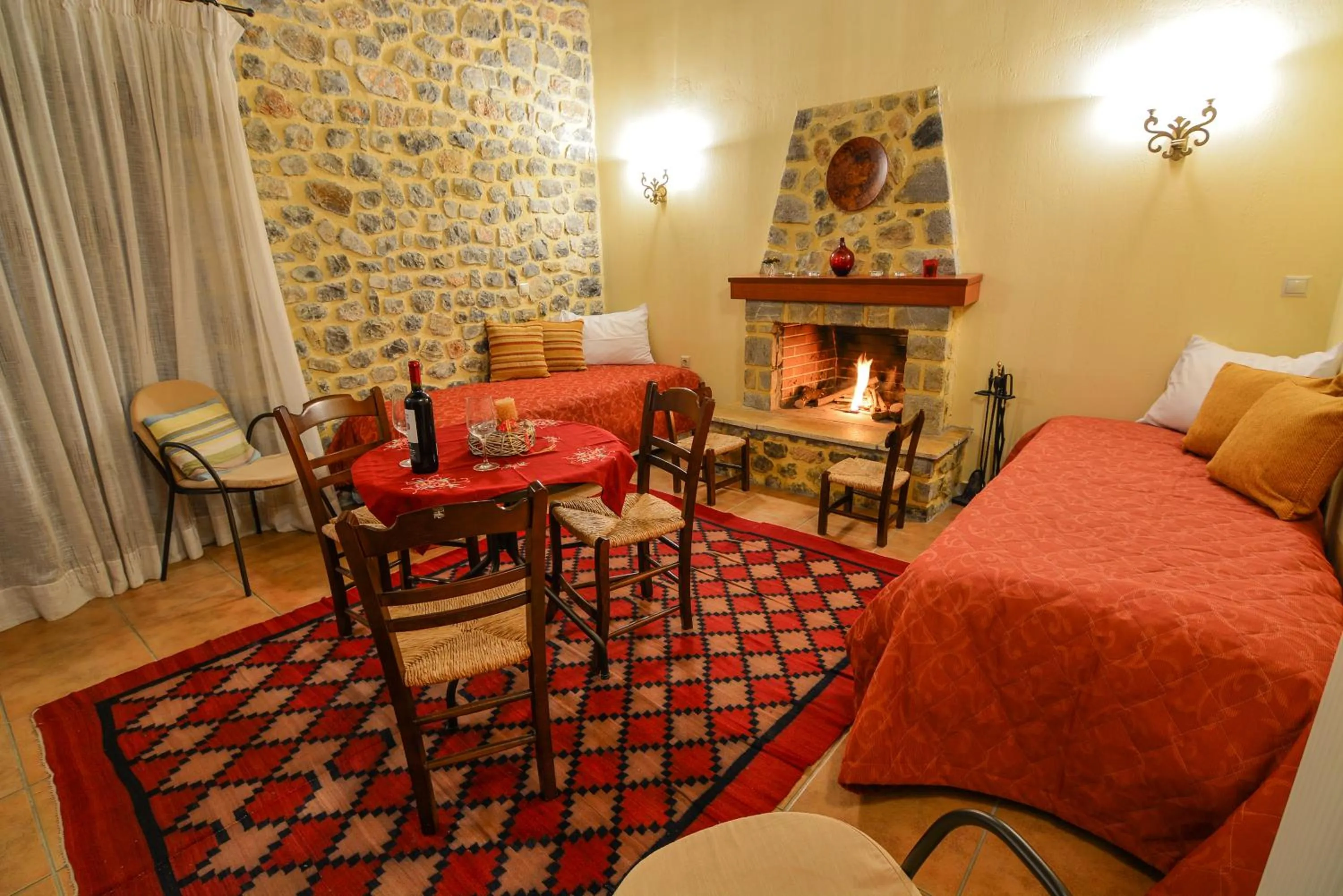 Seating area, Bed in Karyatis Resort