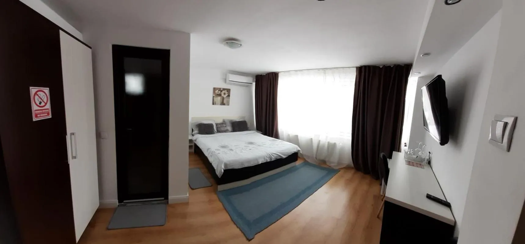 Bed in 4 Seasons Apartments