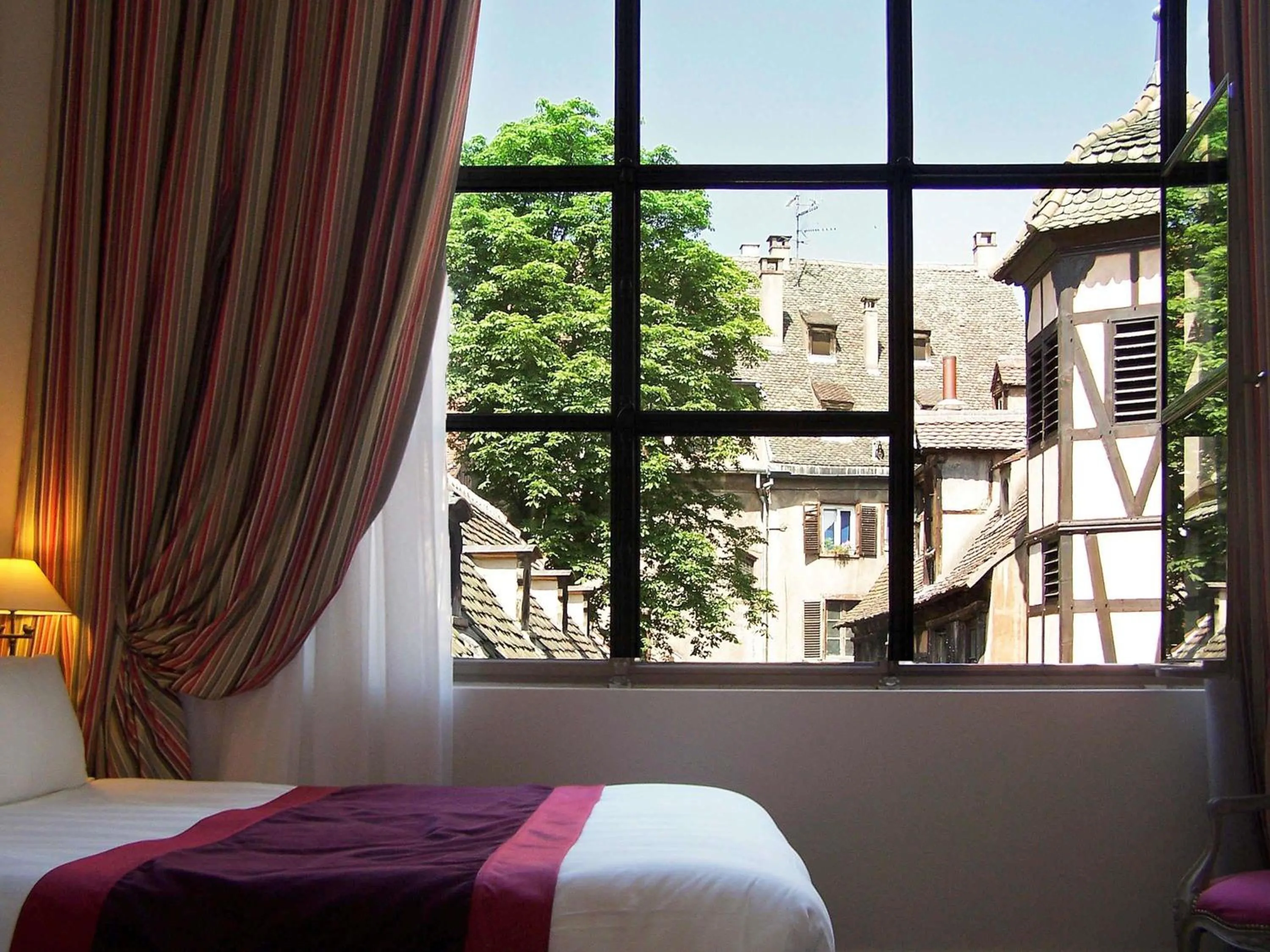 Bedroom, Bed in Cour du Corbeau Hotel Strasbourg - MGallery Collection