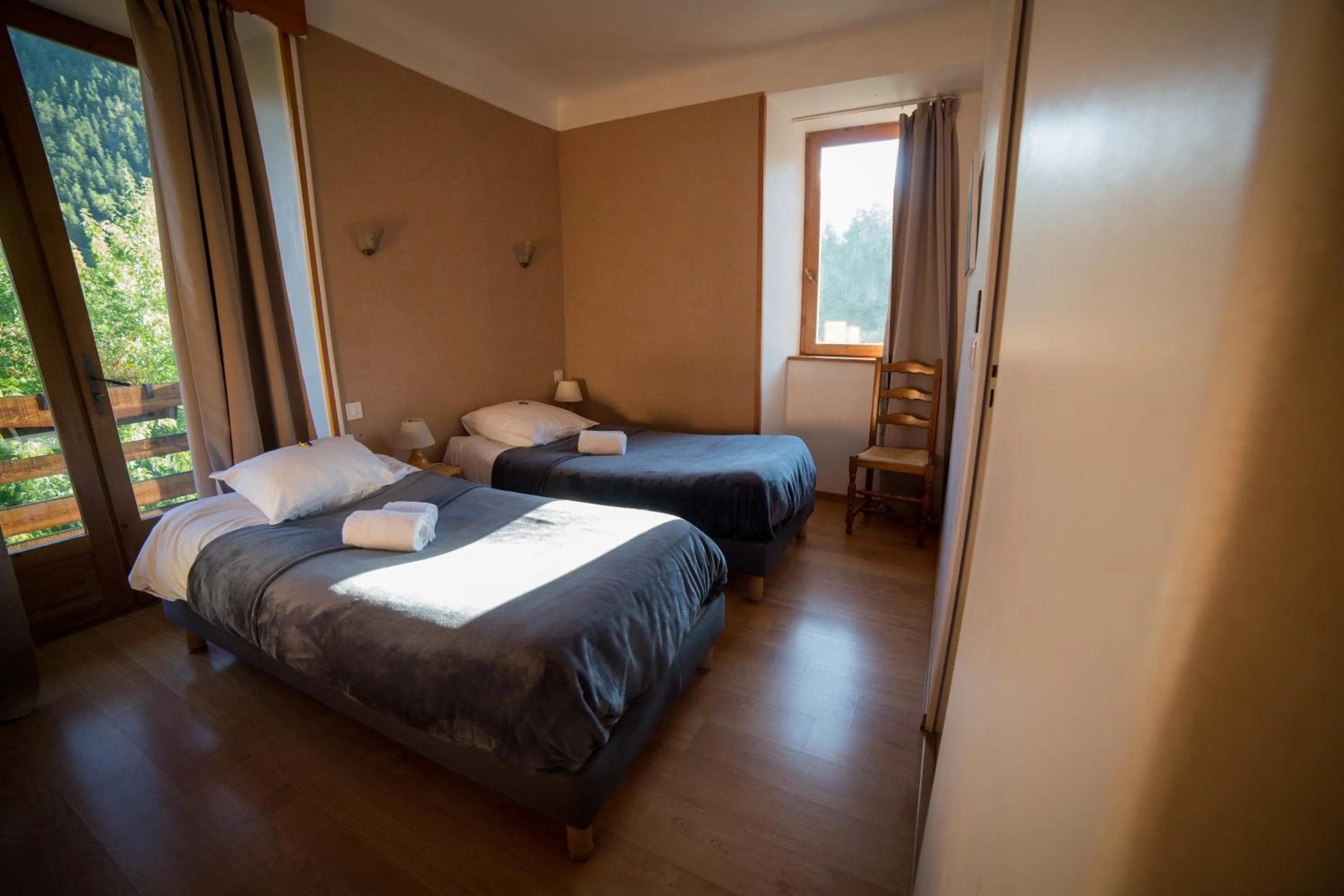 Bed in Hôtel Restaurant Gîtes Les 5 Saisons