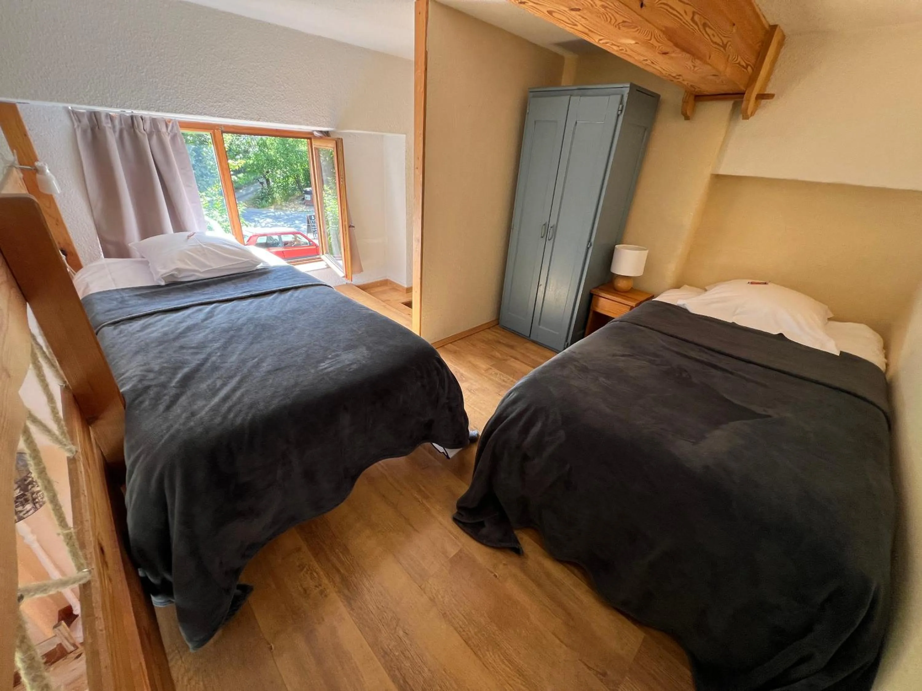 Bed in Hôtel Restaurant Gîtes Les 5 Saisons