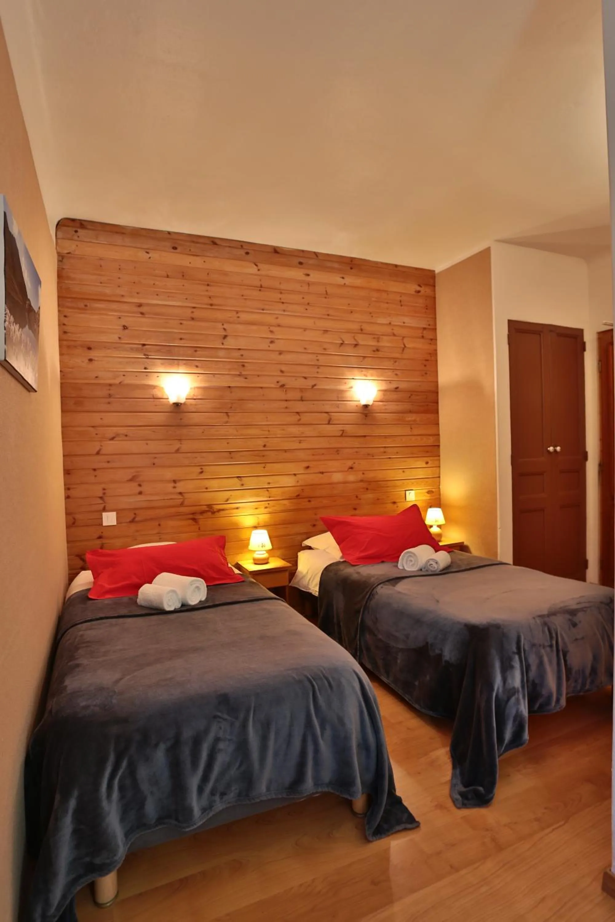 Bed in Hôtel Restaurant Gîtes Les 5 Saisons