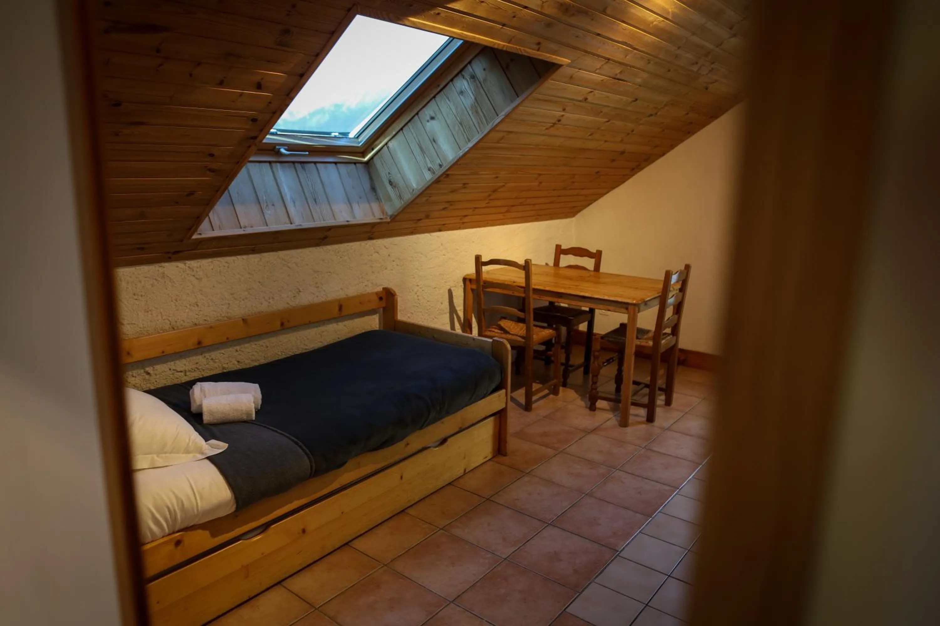 Bed in Hôtel Restaurant Gîtes Les 5 Saisons