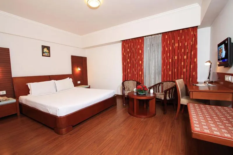 Photo of the whole room, Bed in Parijatha Gateway