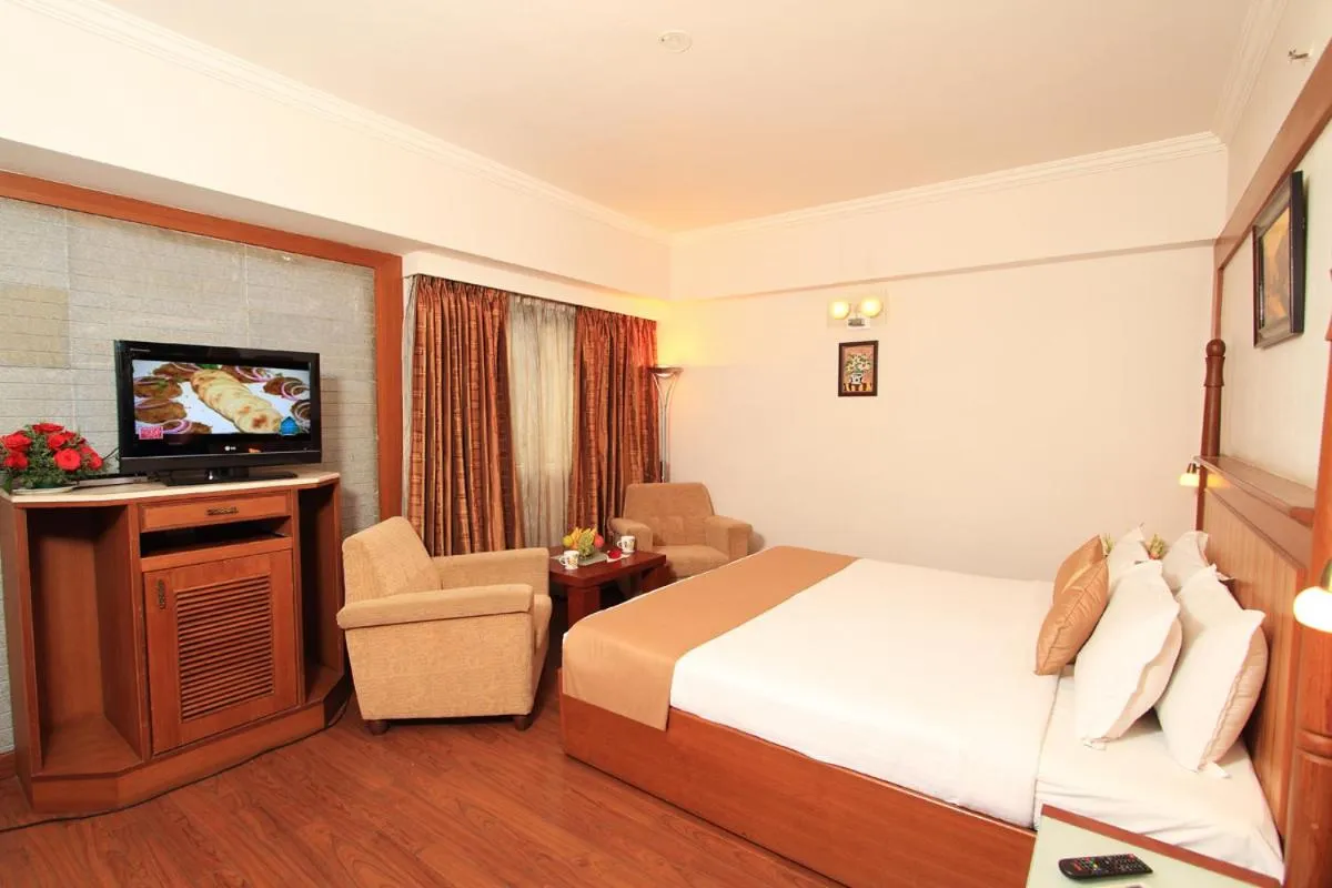 Photo of the whole room, Bed in Parijatha Gateway