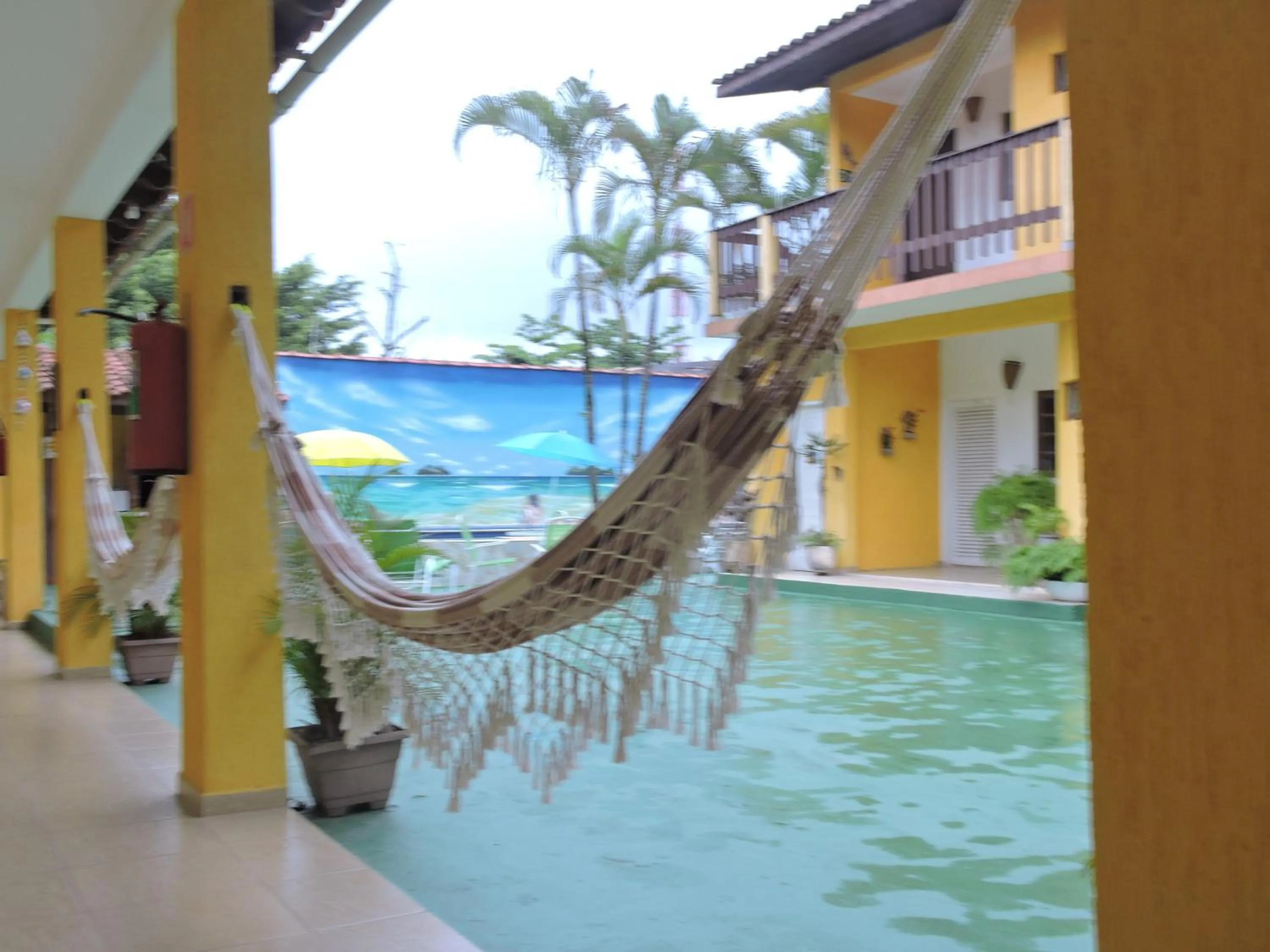 Balcony/Terrace in Pousada Sorocotuba - Piscina Aquecida