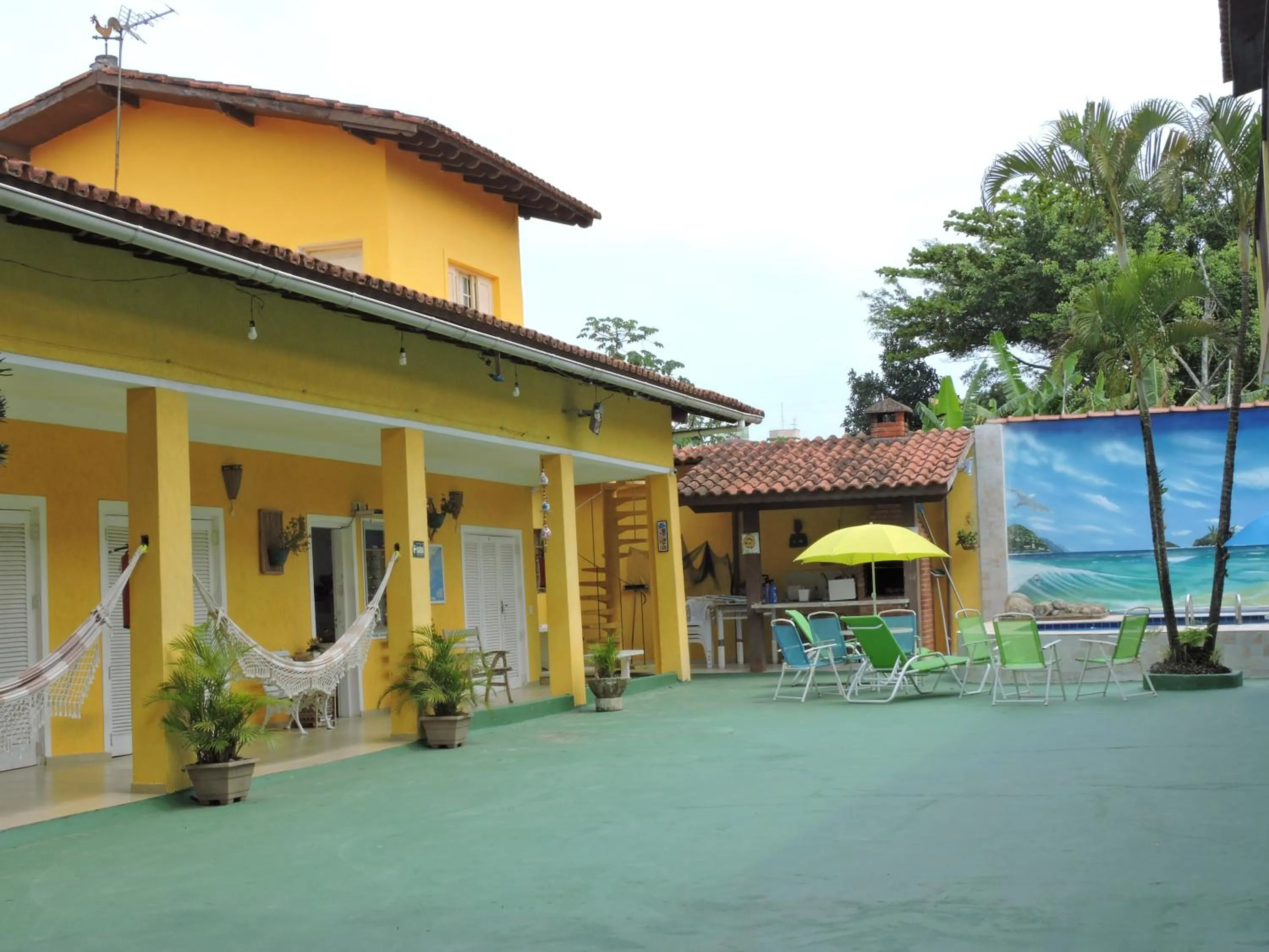 Balcony/Terrace in Pousada Sorocotuba - Piscina Aquecida