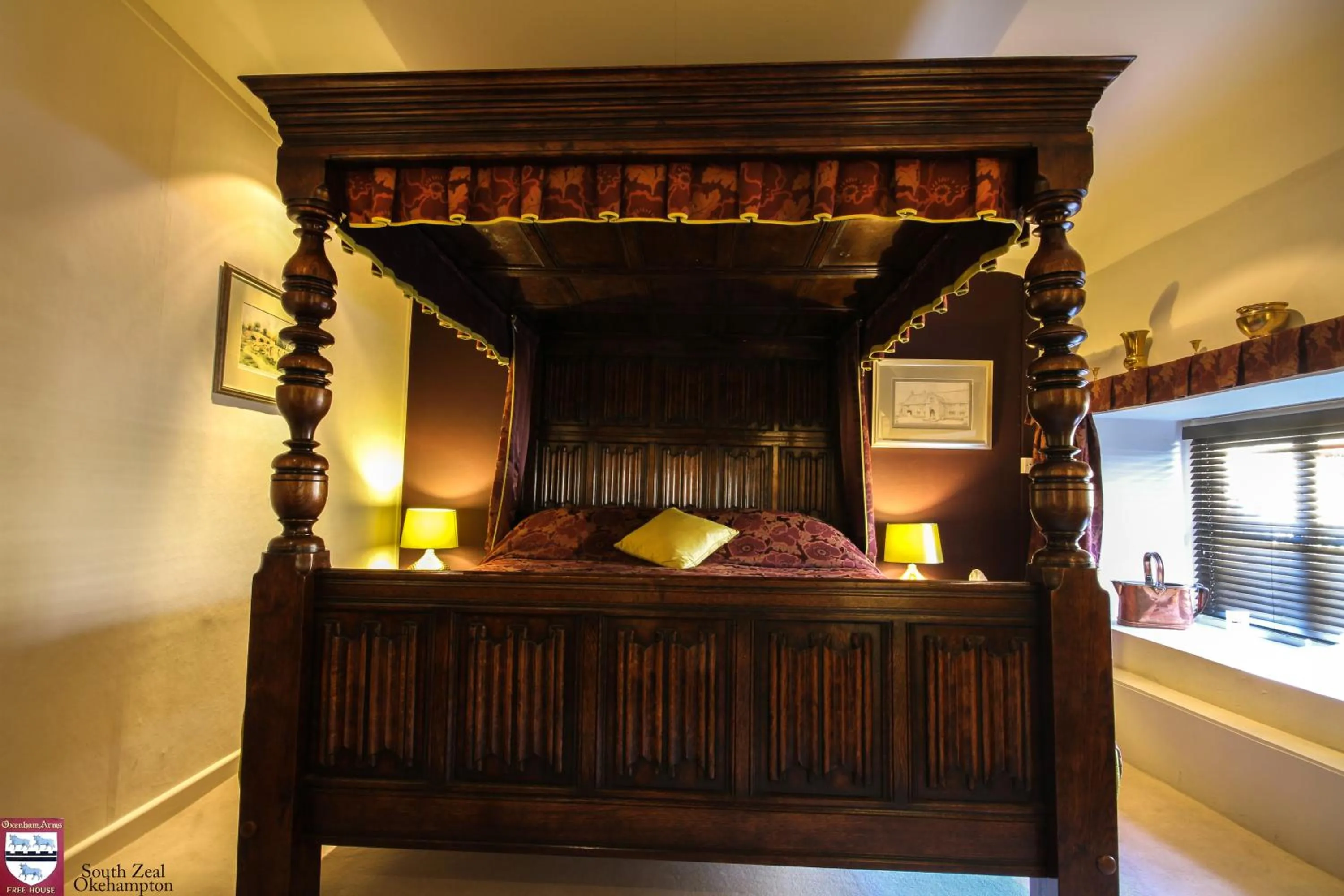 Bed in The Oxenham Arms Hotel Devon
