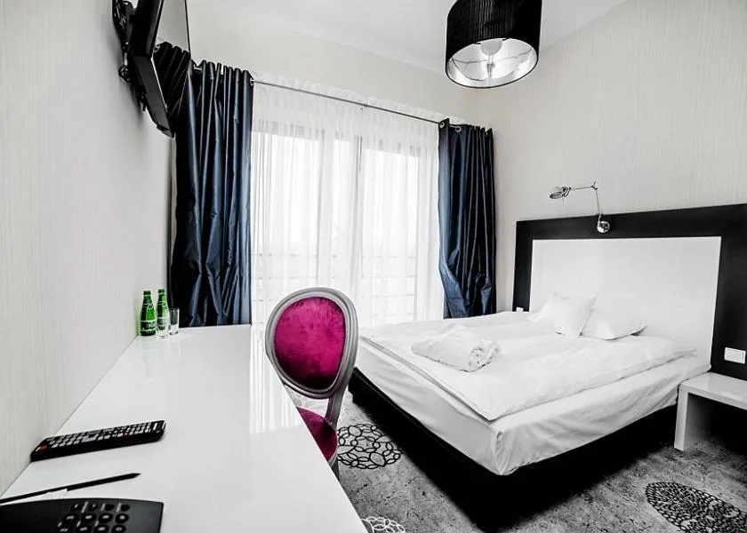 Photo of the whole room, Bed in Lawendowe Termy