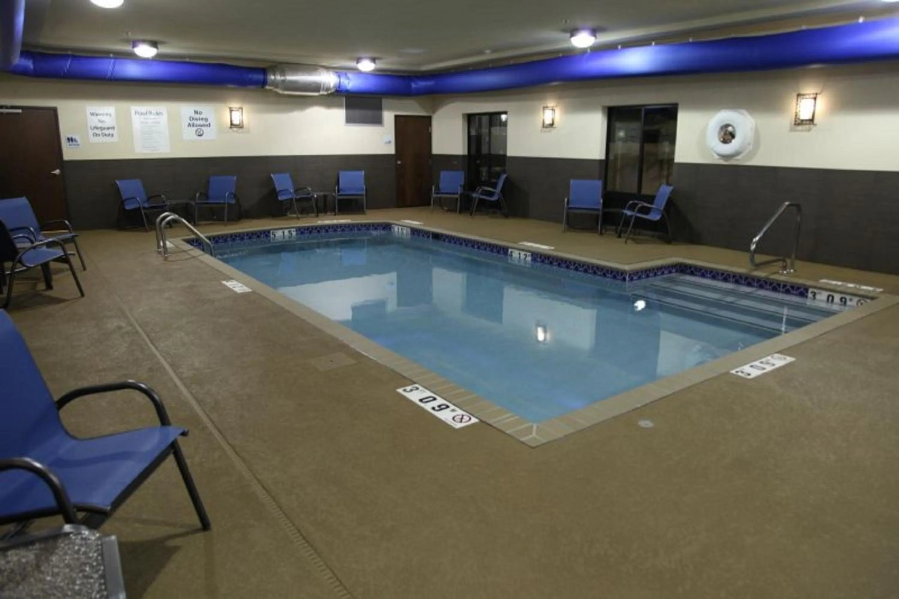 Swimming pool in Holiday Inn Express & Suites - Huntsville Airport by IHG