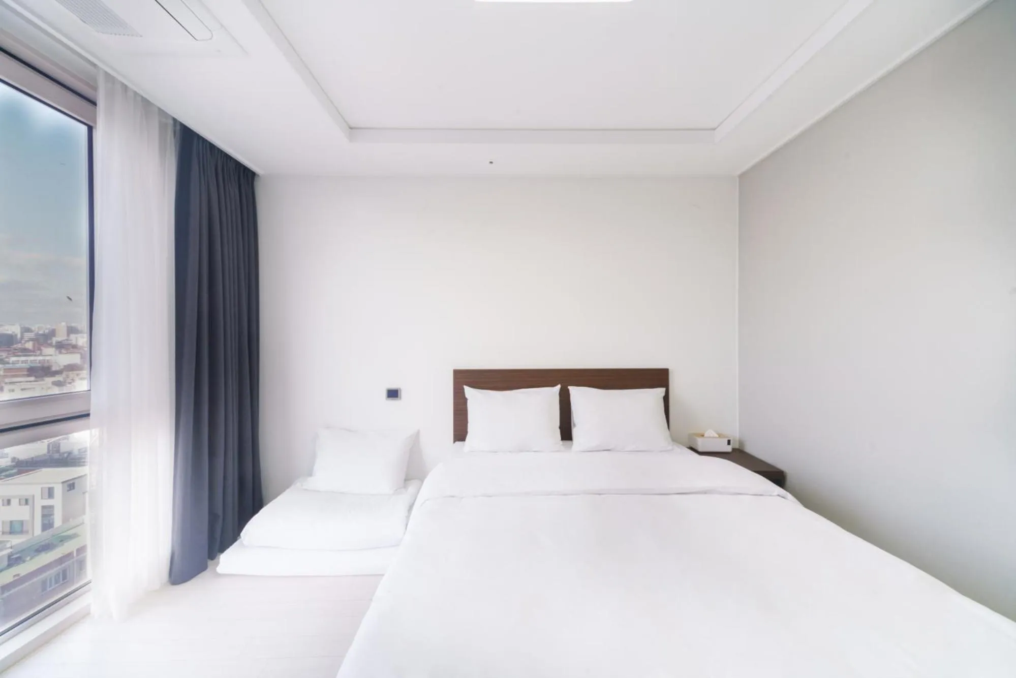 Bed in The Venezia Suite Hotel