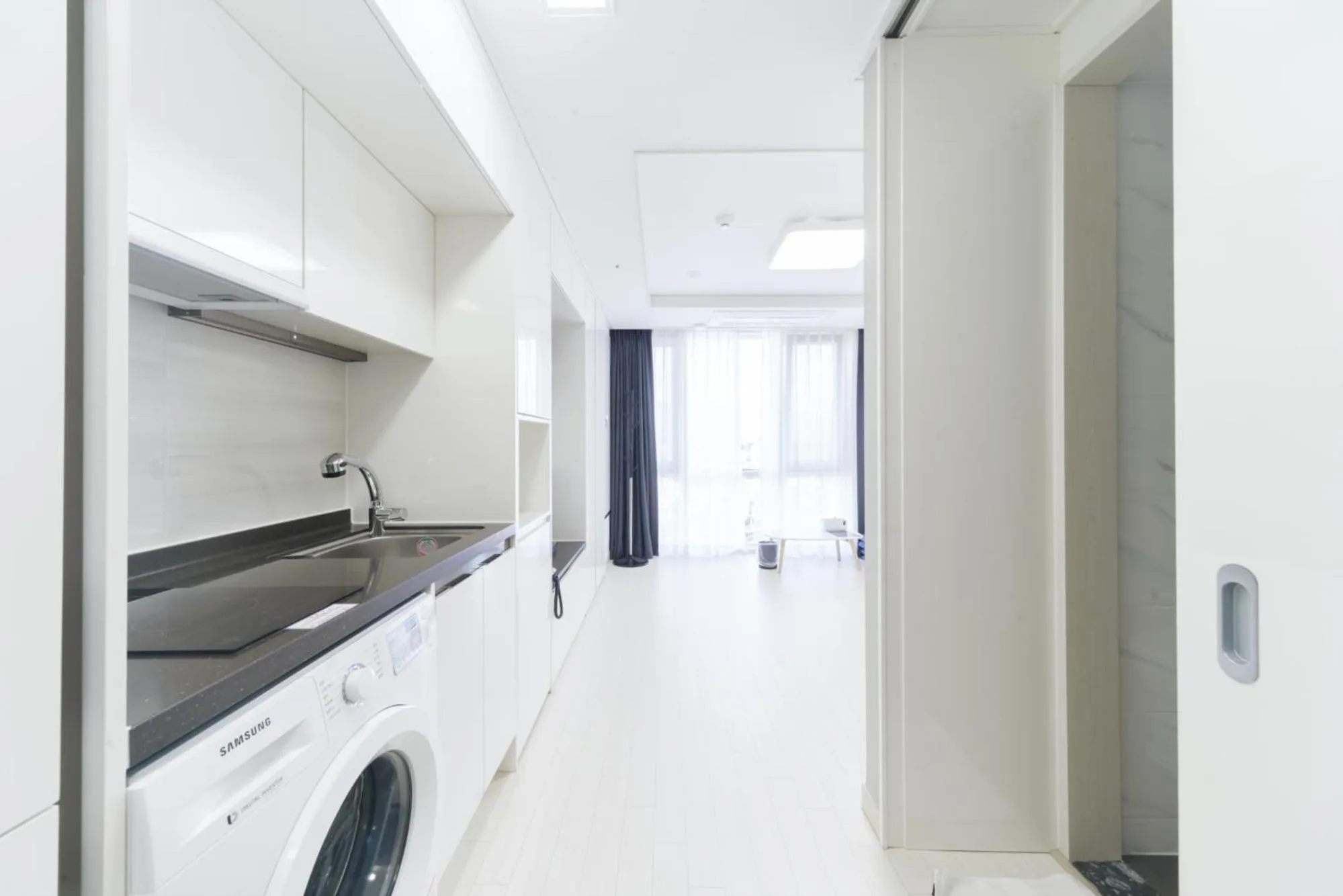 Kitchen or kitchenette in The Venezia Suite Hotel