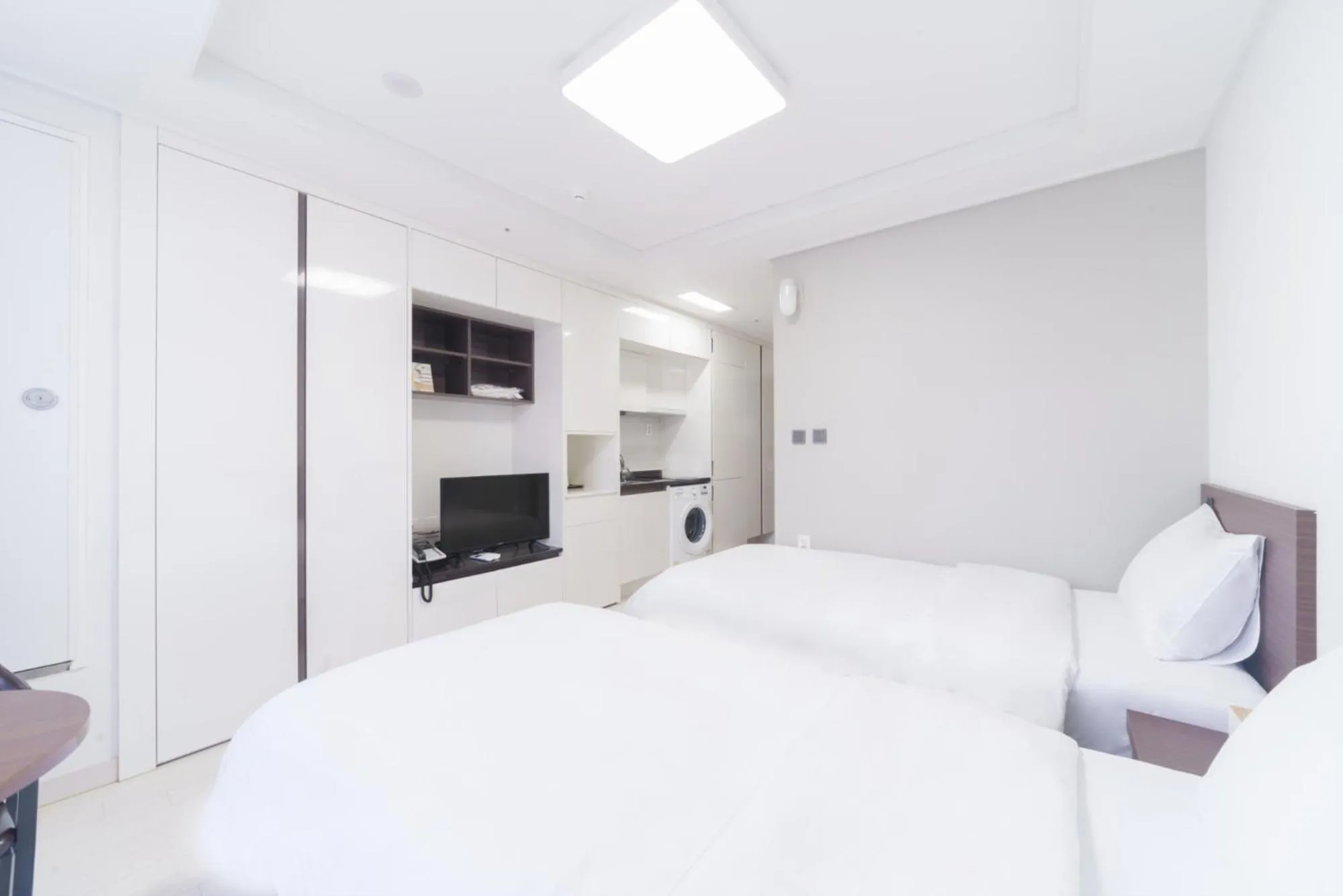 Bed in The Venezia Suite Hotel