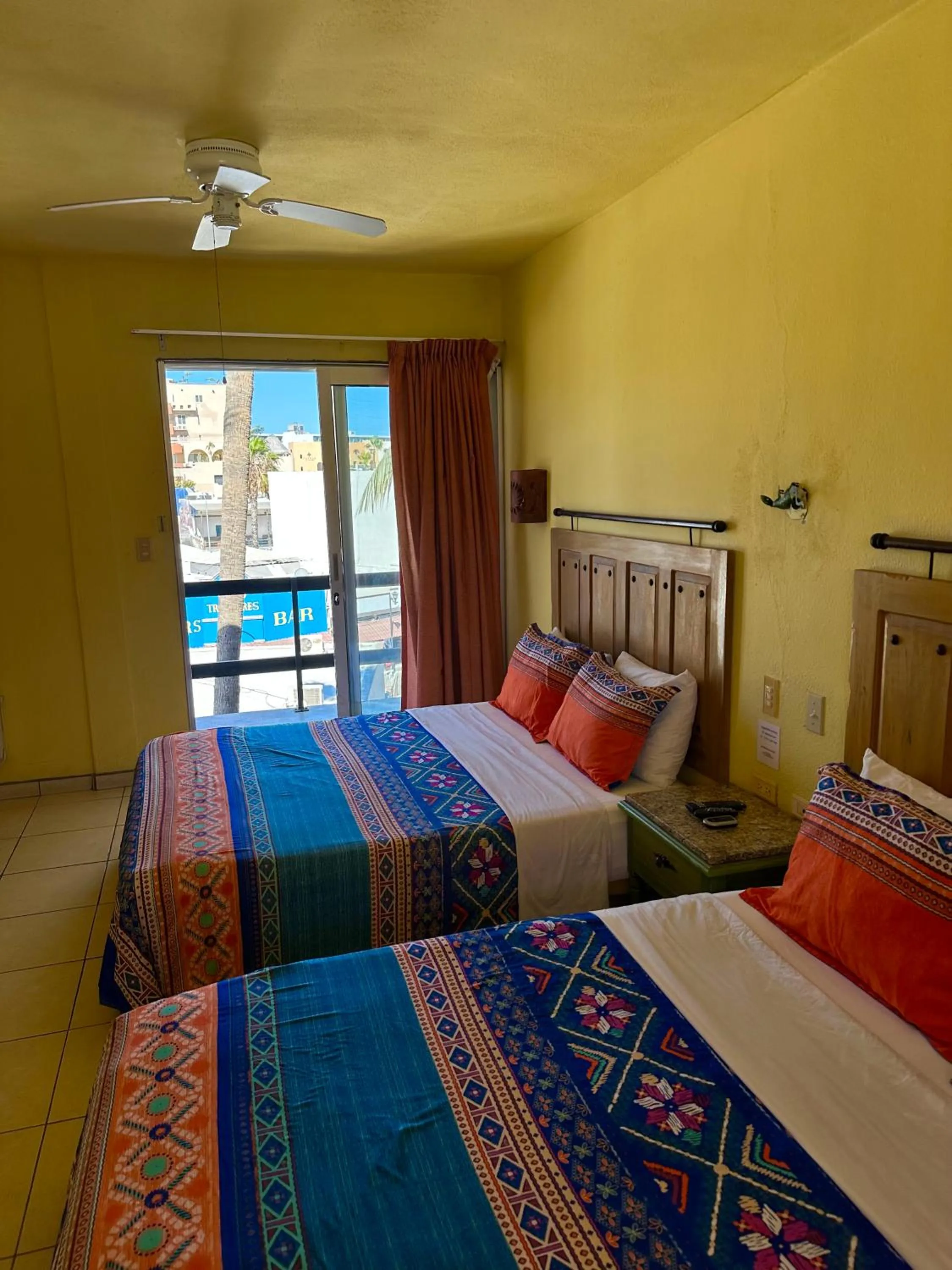 Bed in Siesta Suites Boutique Hotel