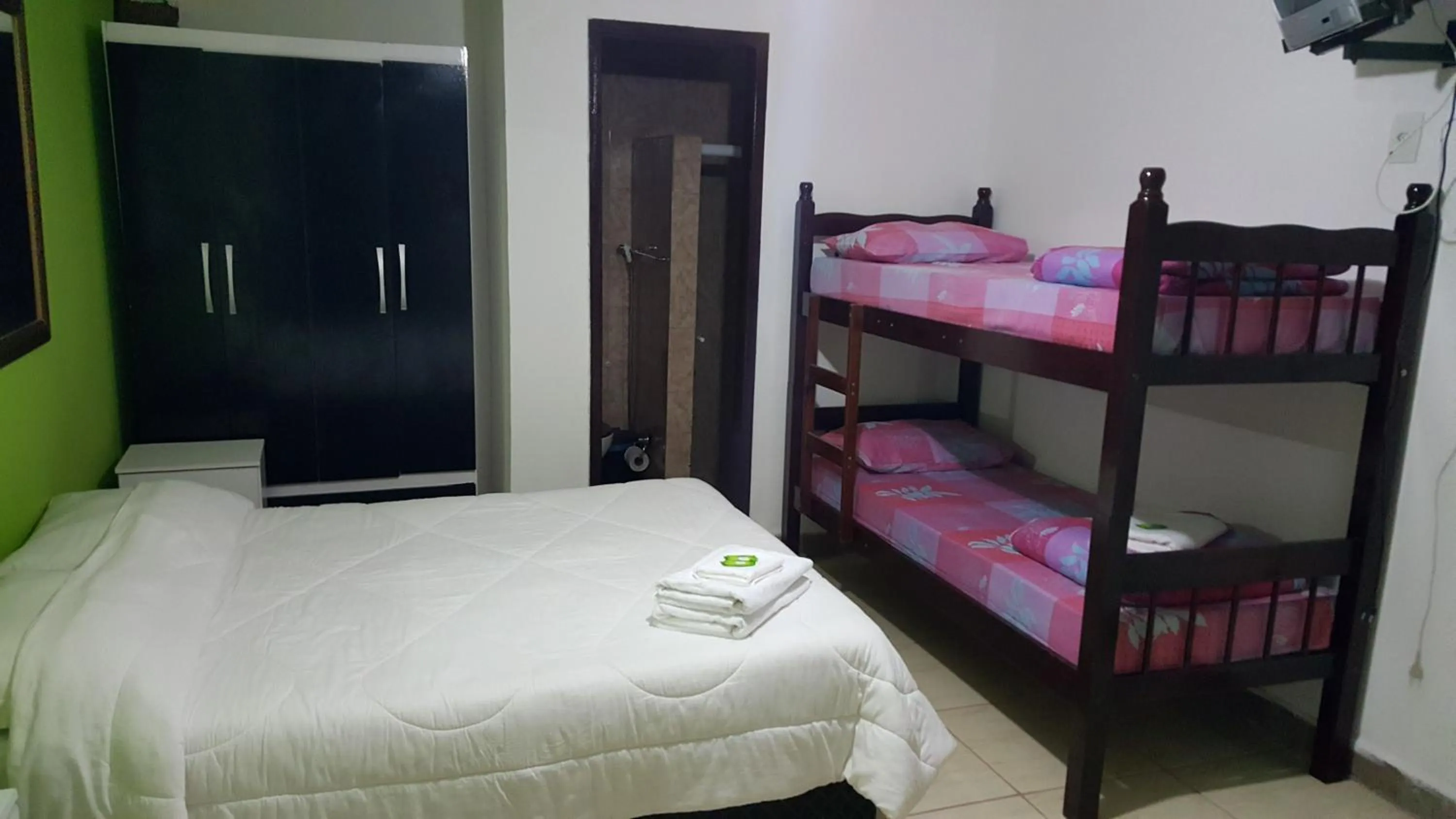 Bed in Pousada Ferradura Beach