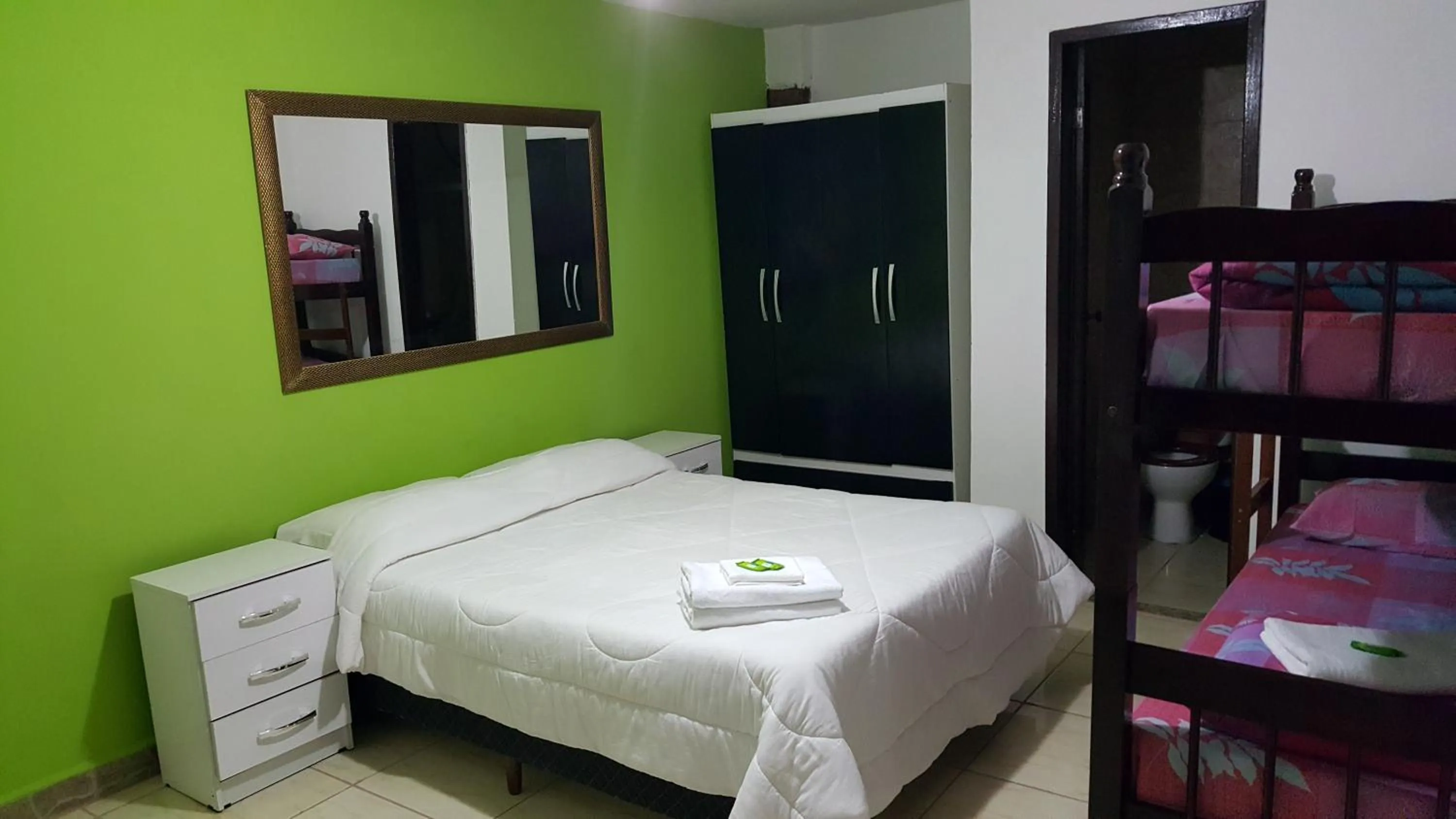 Bed in Pousada Ferradura Beach