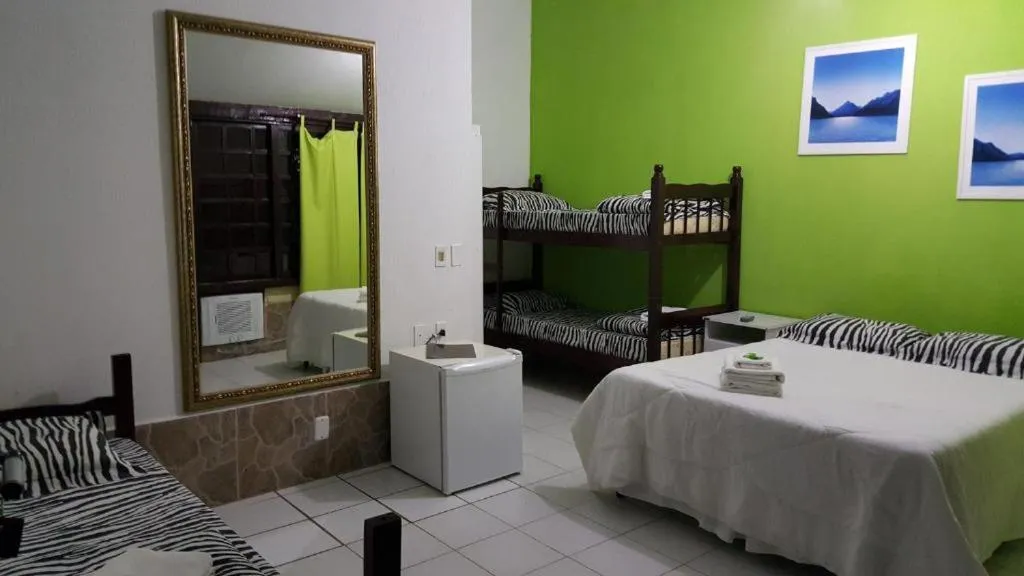 Bed in Pousada Ferradura Beach