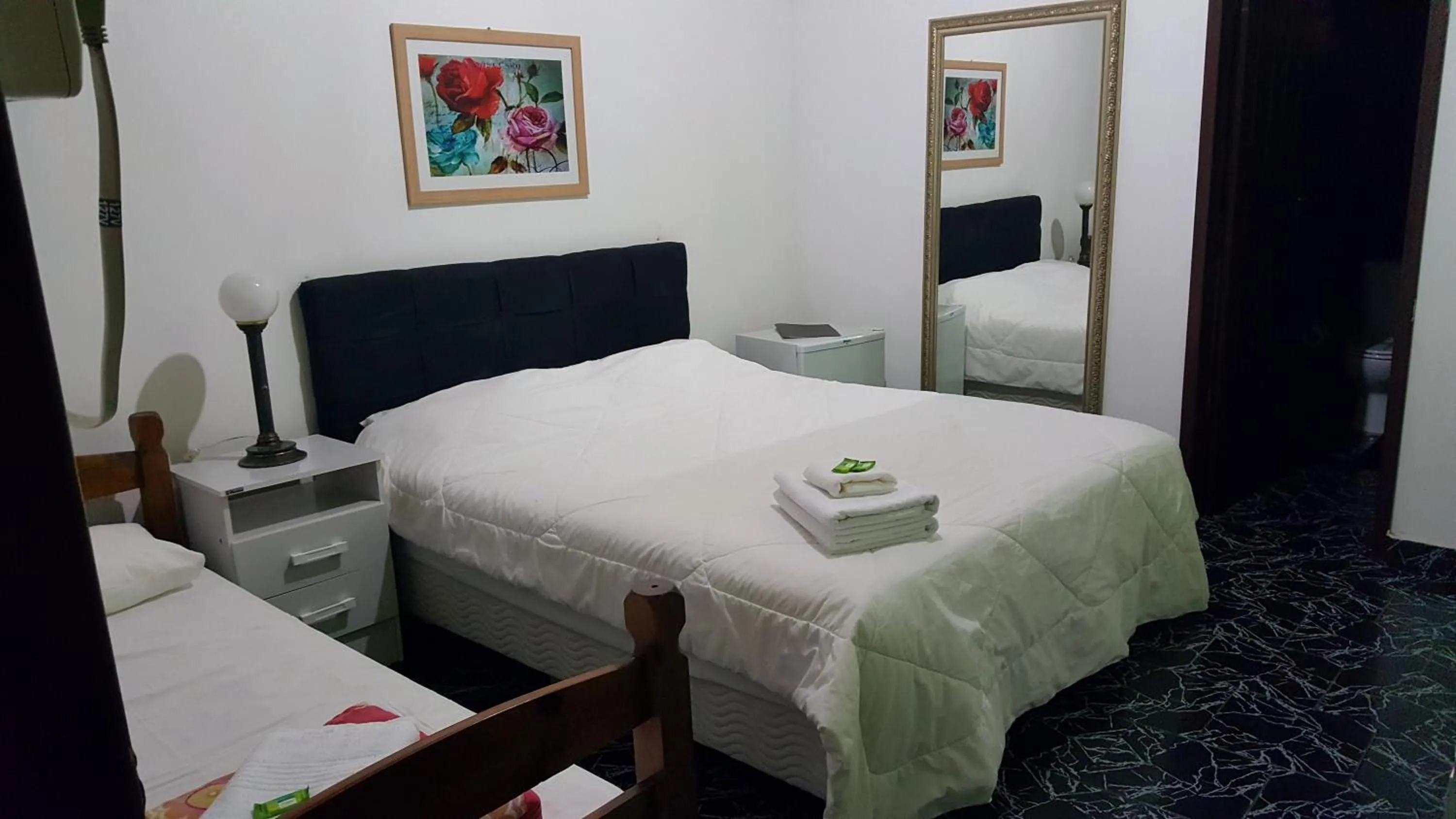 Bed in Pousada Ferradura Beach