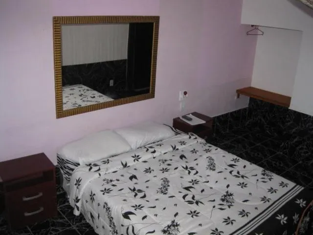 Bed in Pousada Ferradura Beach