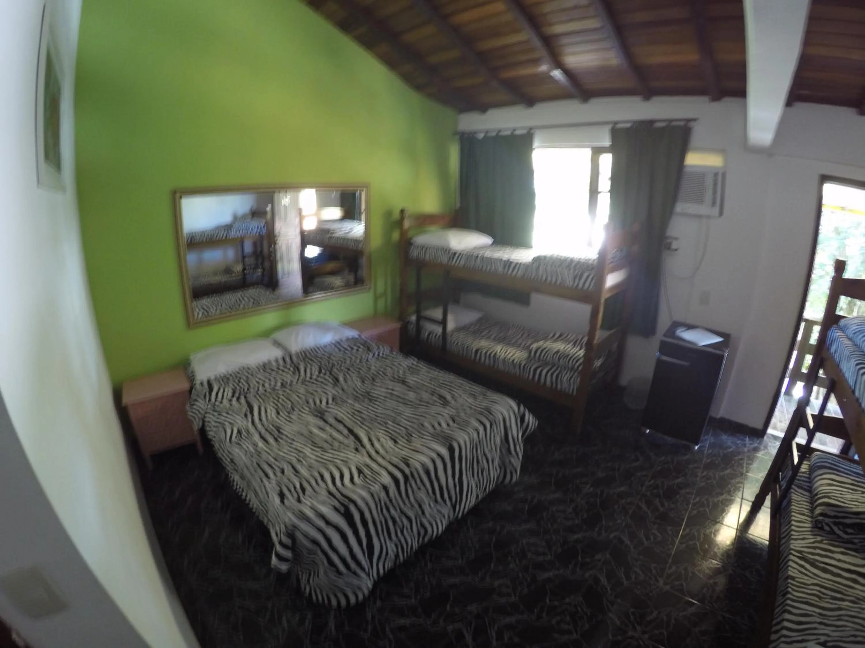 Bed in Pousada Ferradura Beach