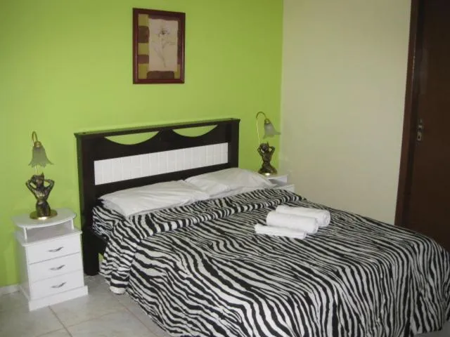 Bed in Pousada Ferradura Beach