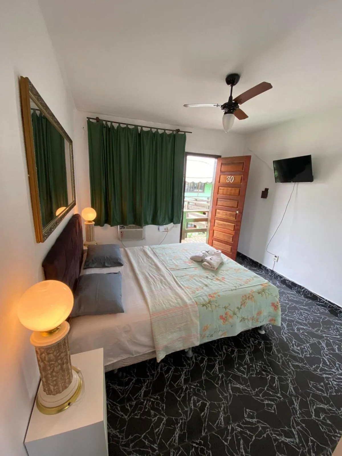 Bed in Pousada Ferradura Beach