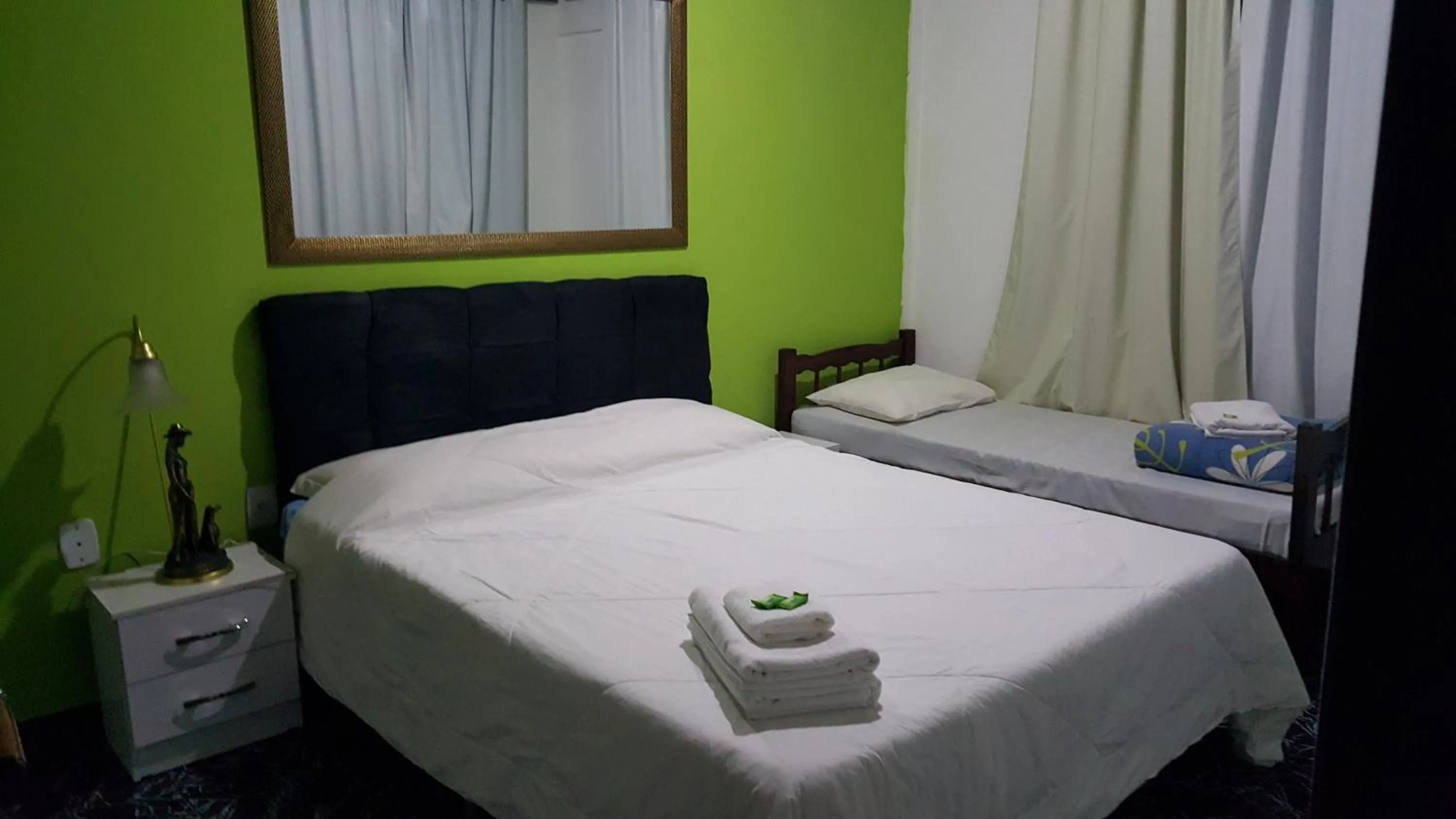 Bed in Pousada Ferradura Beach