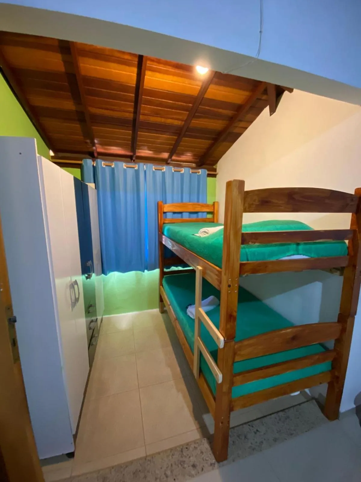 Bed in Pousada Ferradura Beach