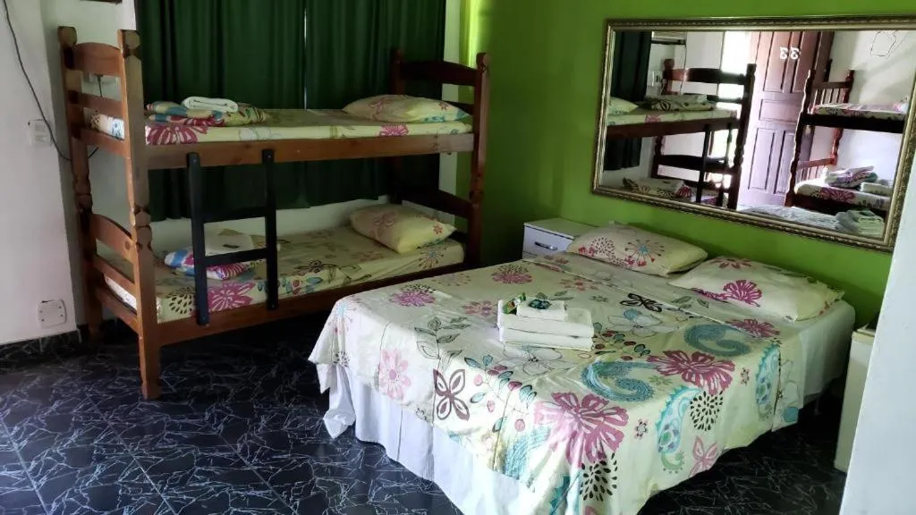 Bed in Pousada Ferradura Beach