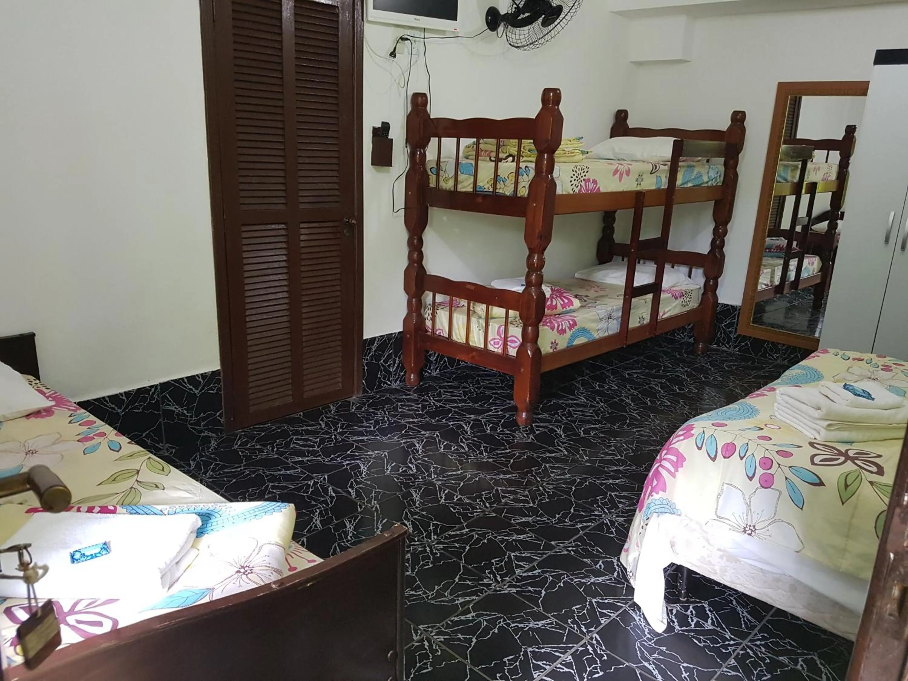 Bed in Pousada Ferradura Beach