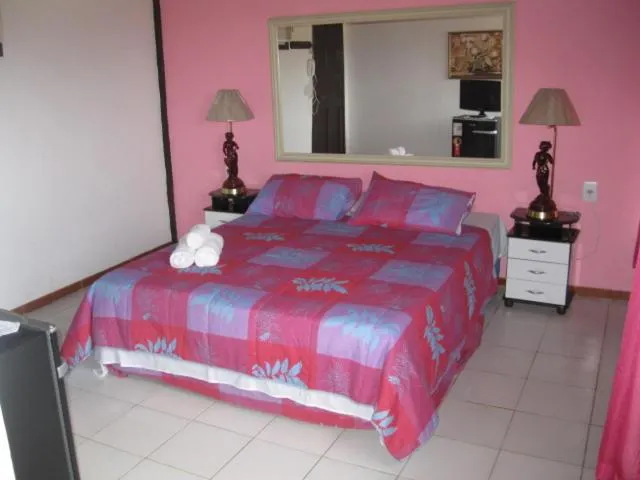 Bed in Pousada Ferradura Beach