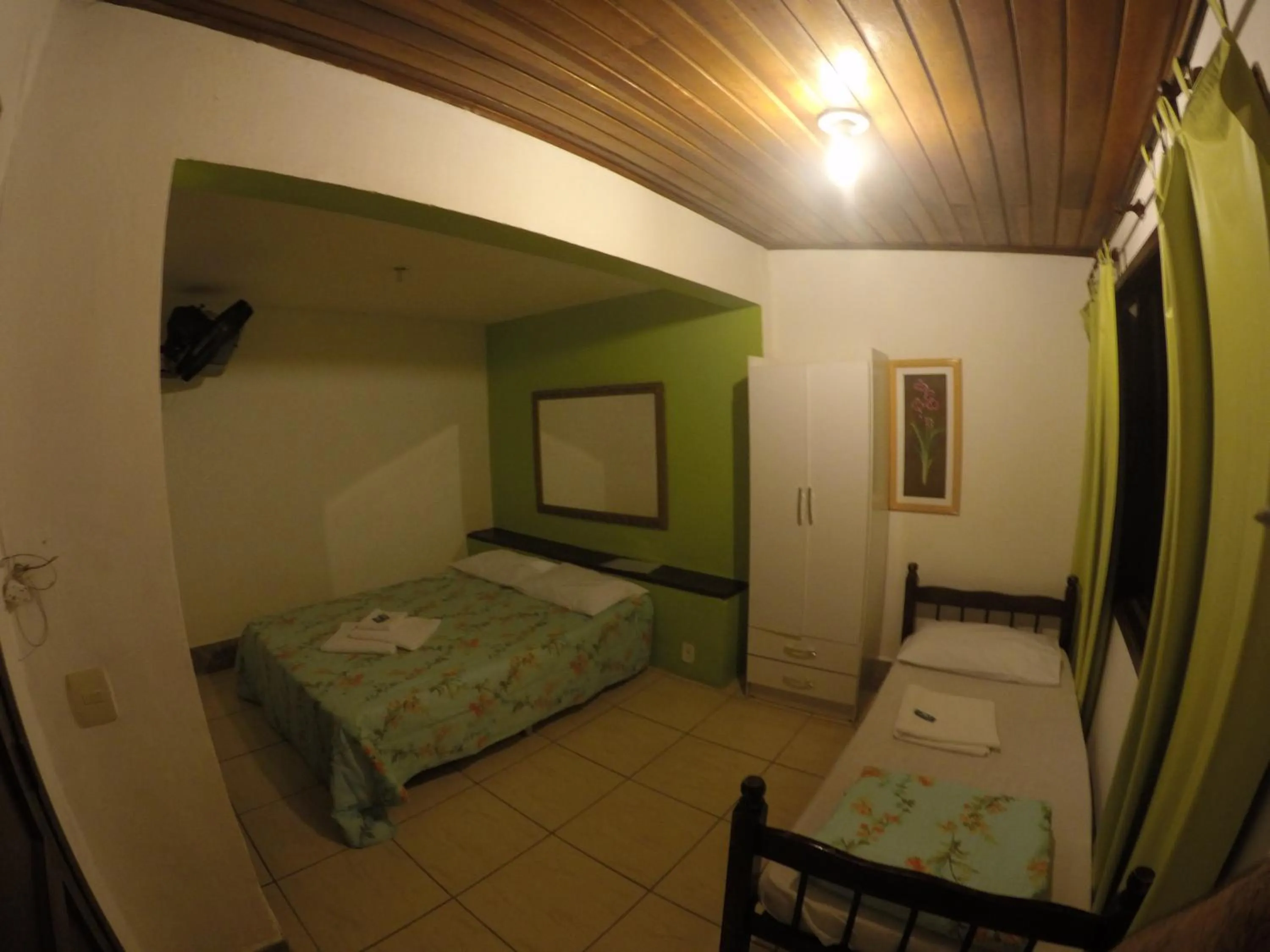 Bed in Pousada Ferradura Beach