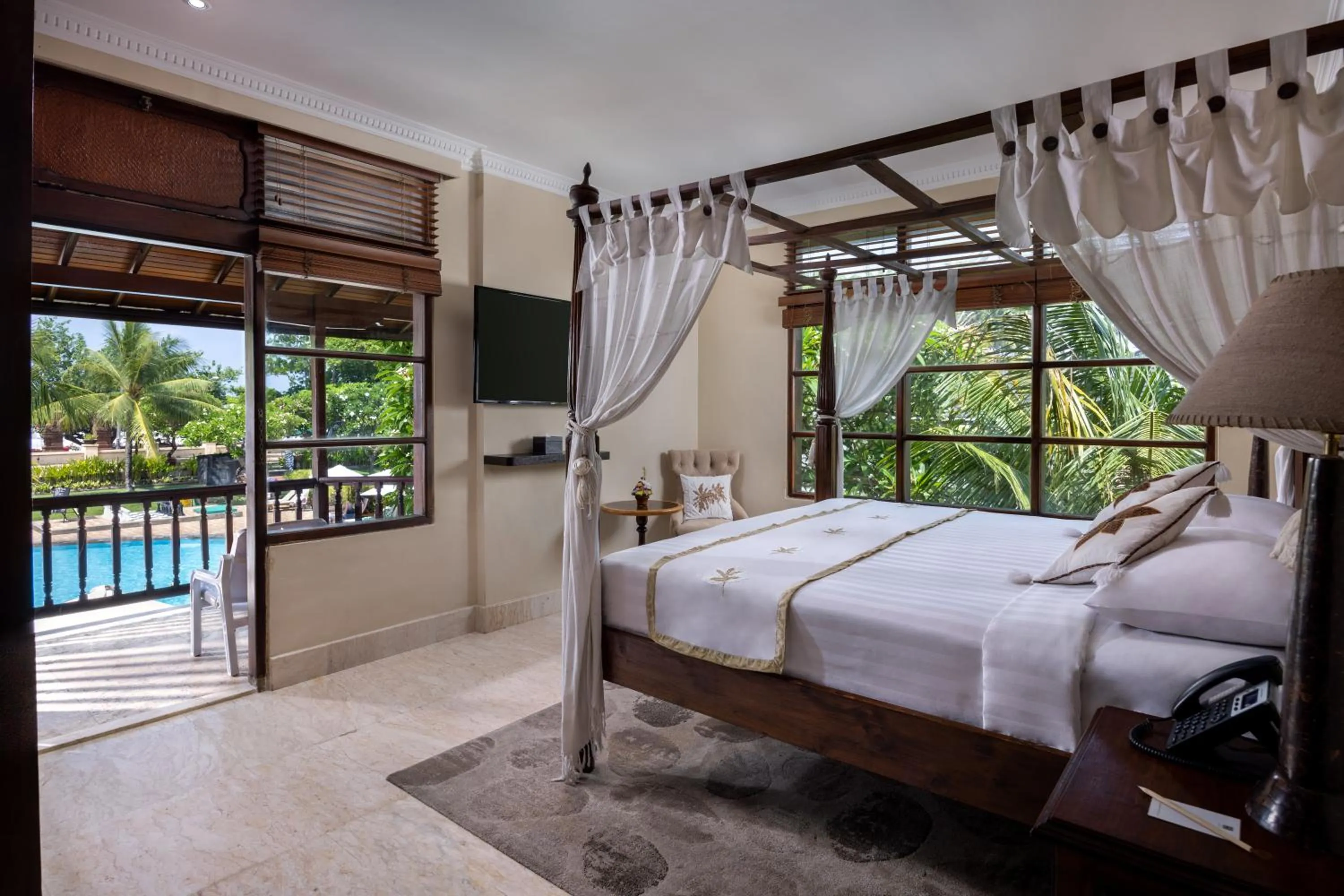Bed in The Jayakarta Bali Beach Resort