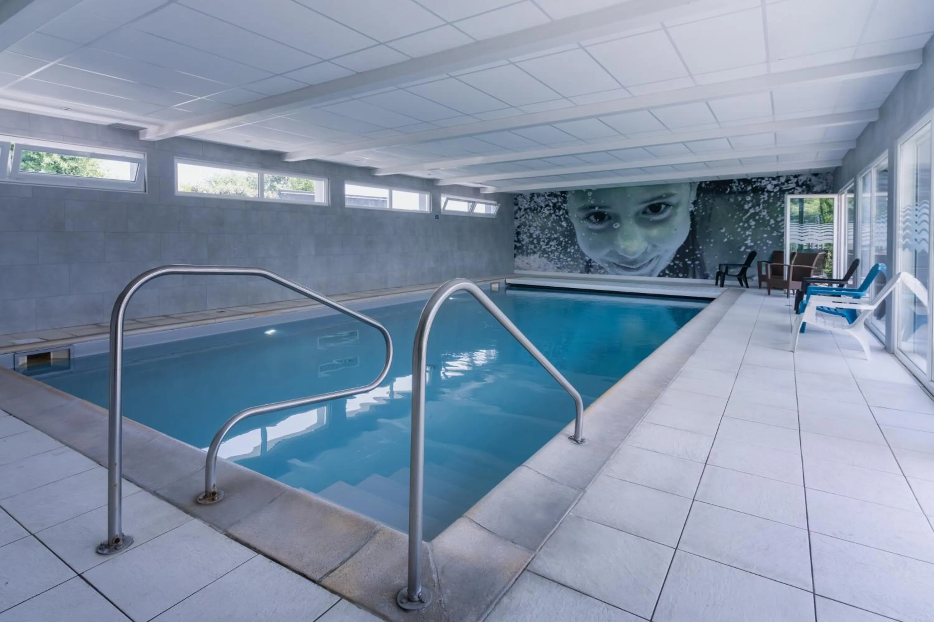 Swimming pool in BRIT HOTEL - RESTAURANT Saint-Brieuc Langueux