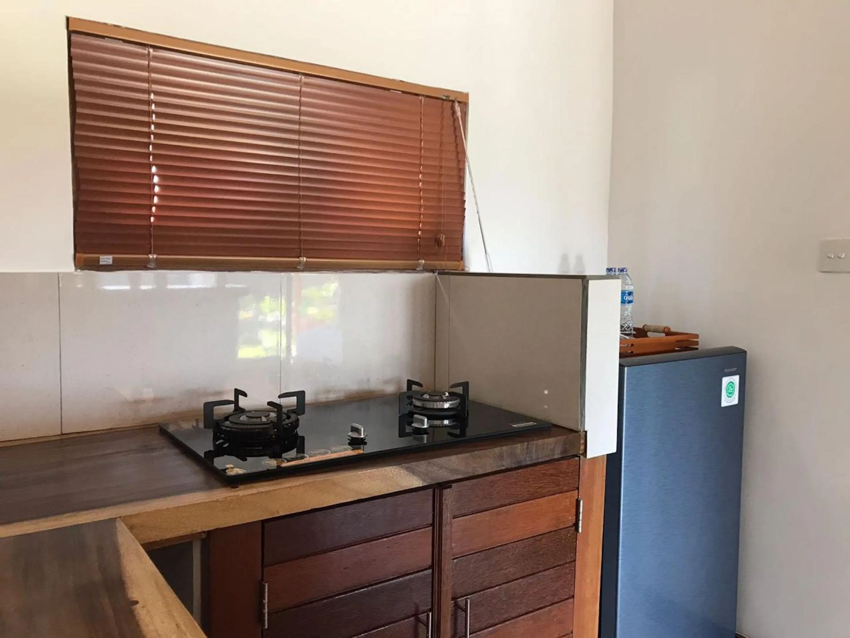 Kitchen or kitchenette in Paraiso Cottage Ubud