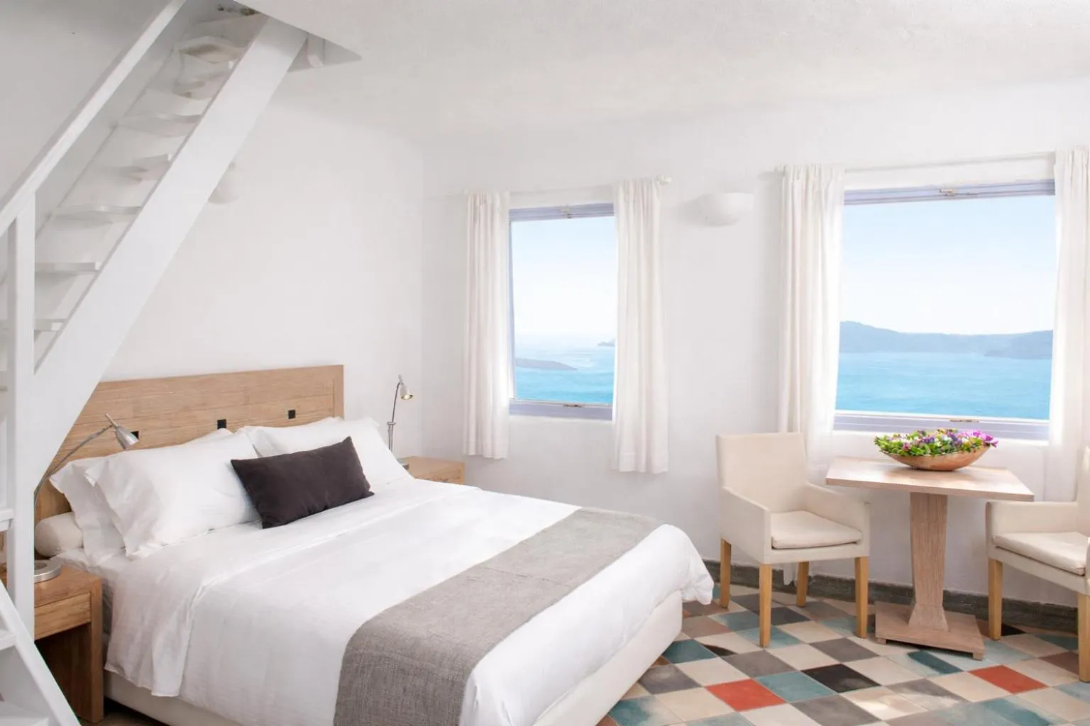 Bed in Ikastikies Suites