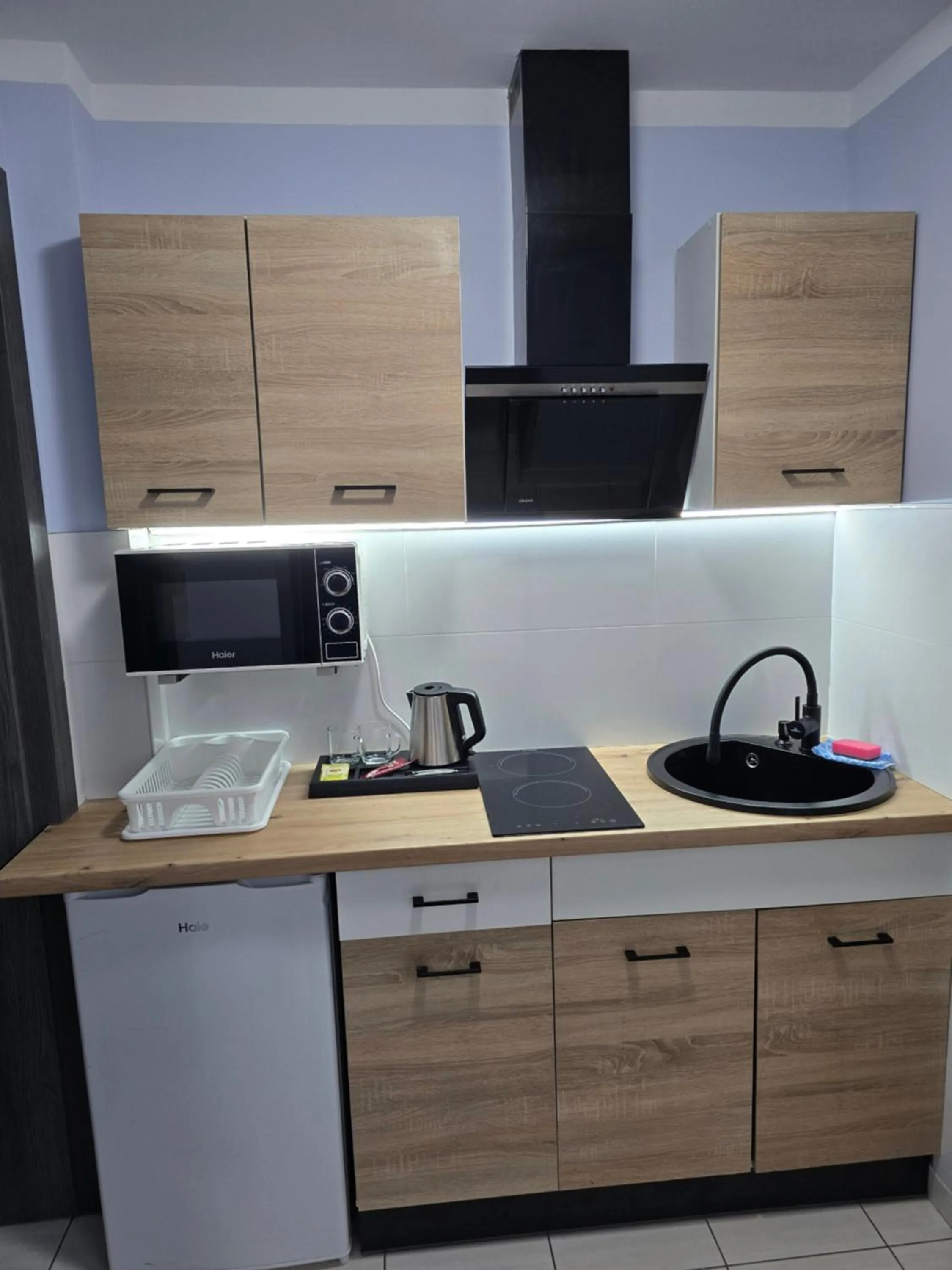 Kitchen or kitchenette in Eldom-NOCLEGI, Kolejowa 15 Wągrowiec