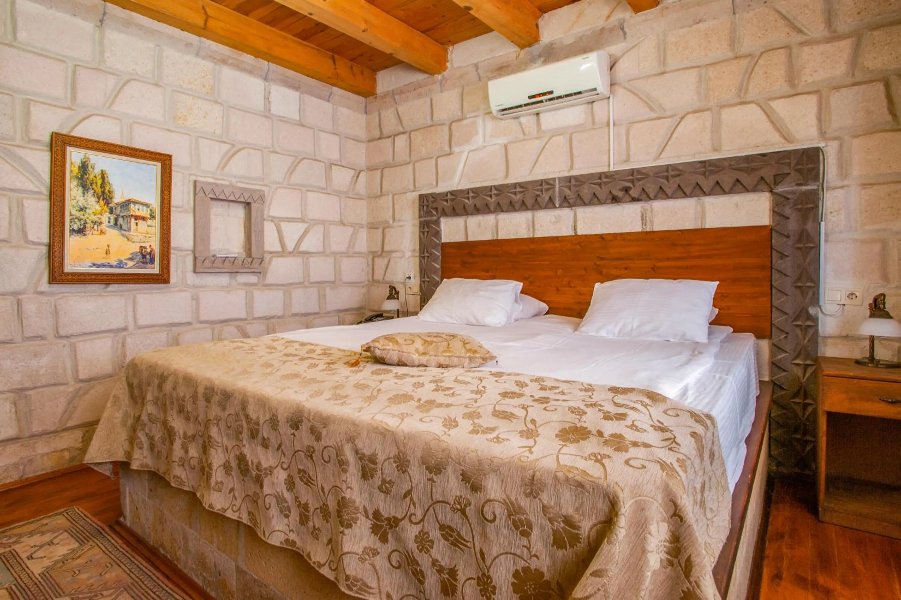 Bed in Ottoman Cave Suites