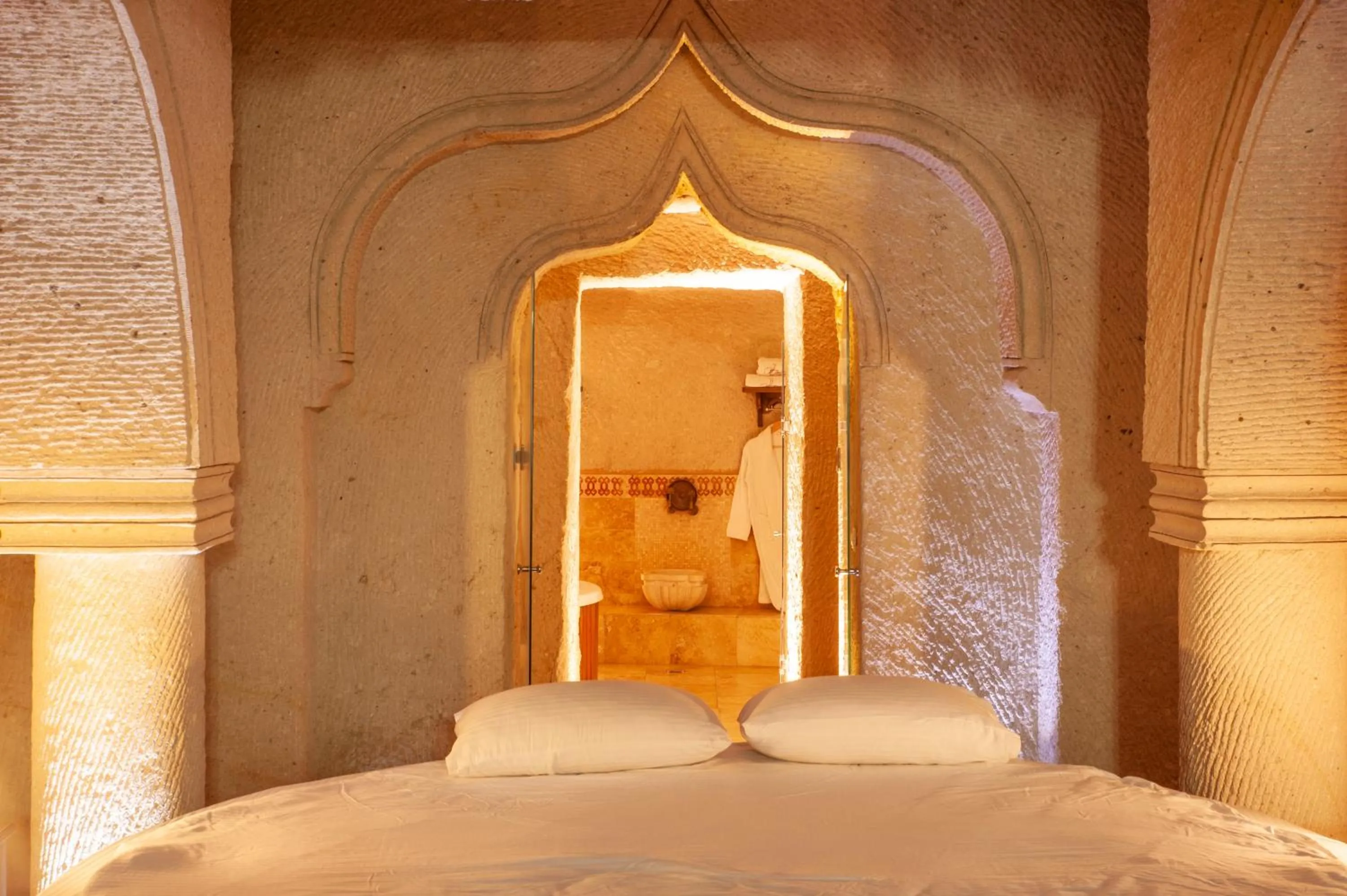 Bed in Ottoman Cave Suites