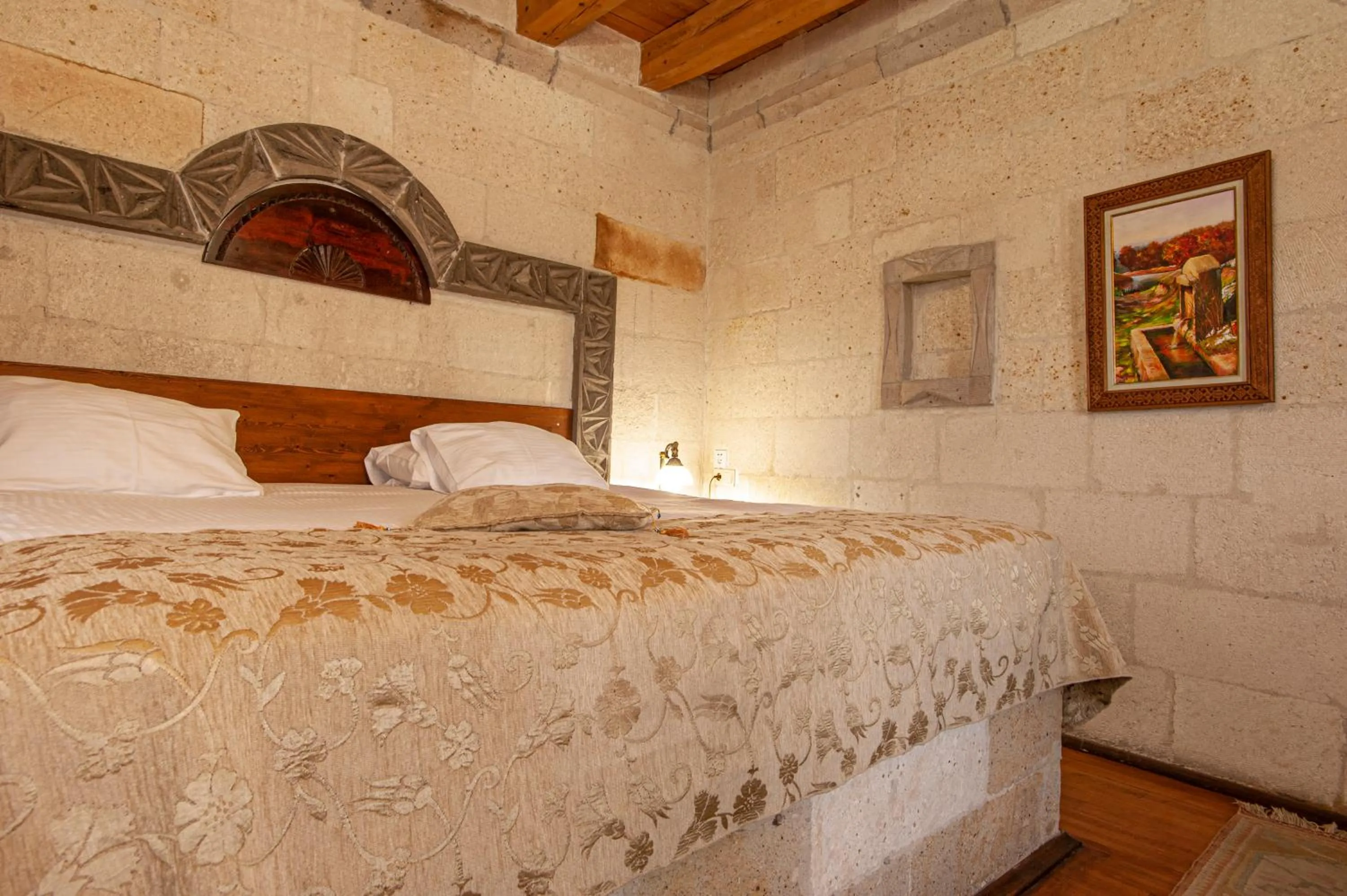 Bed in Ottoman Cave Suites