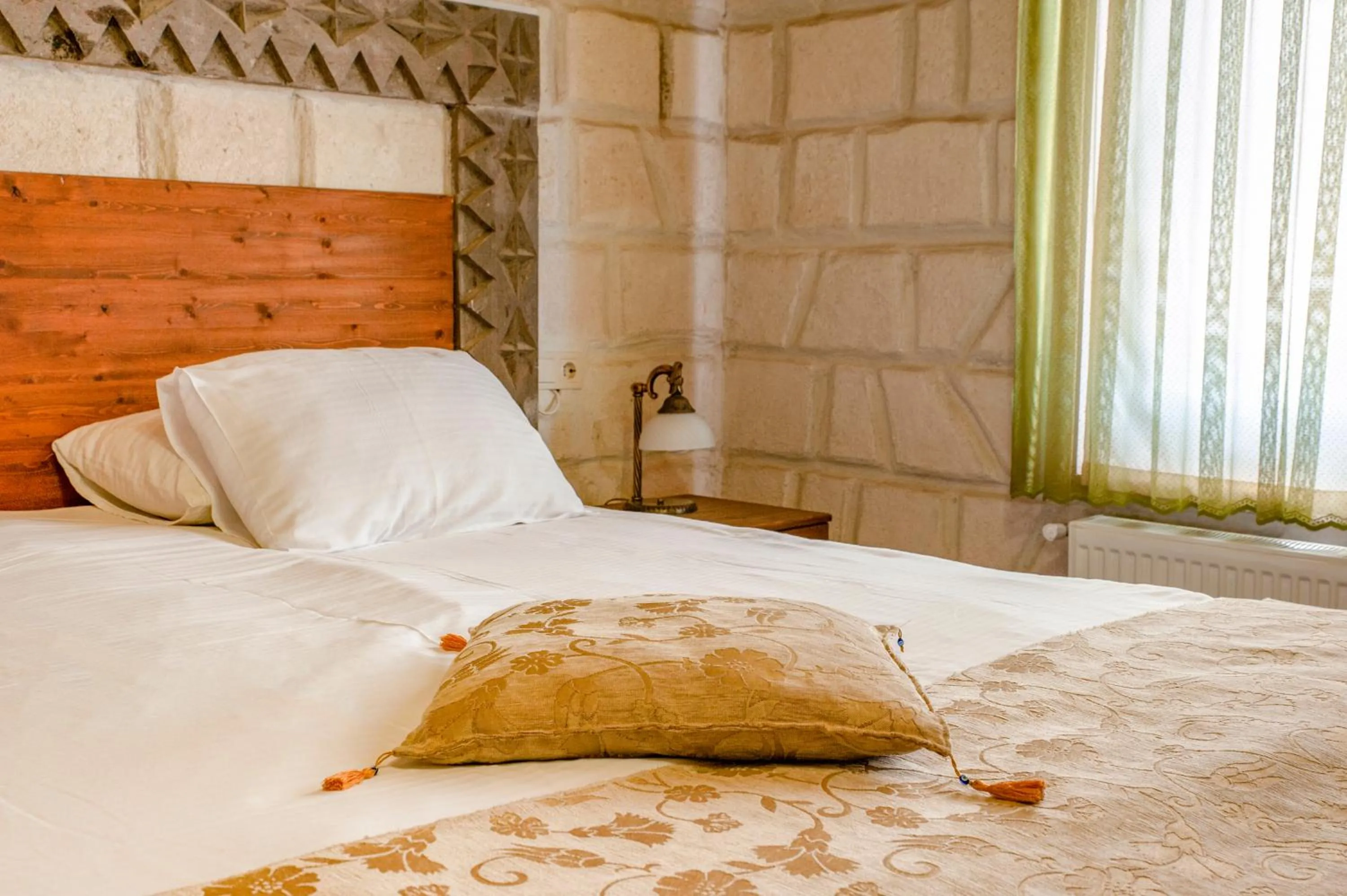 Bed in Ottoman Cave Suites
