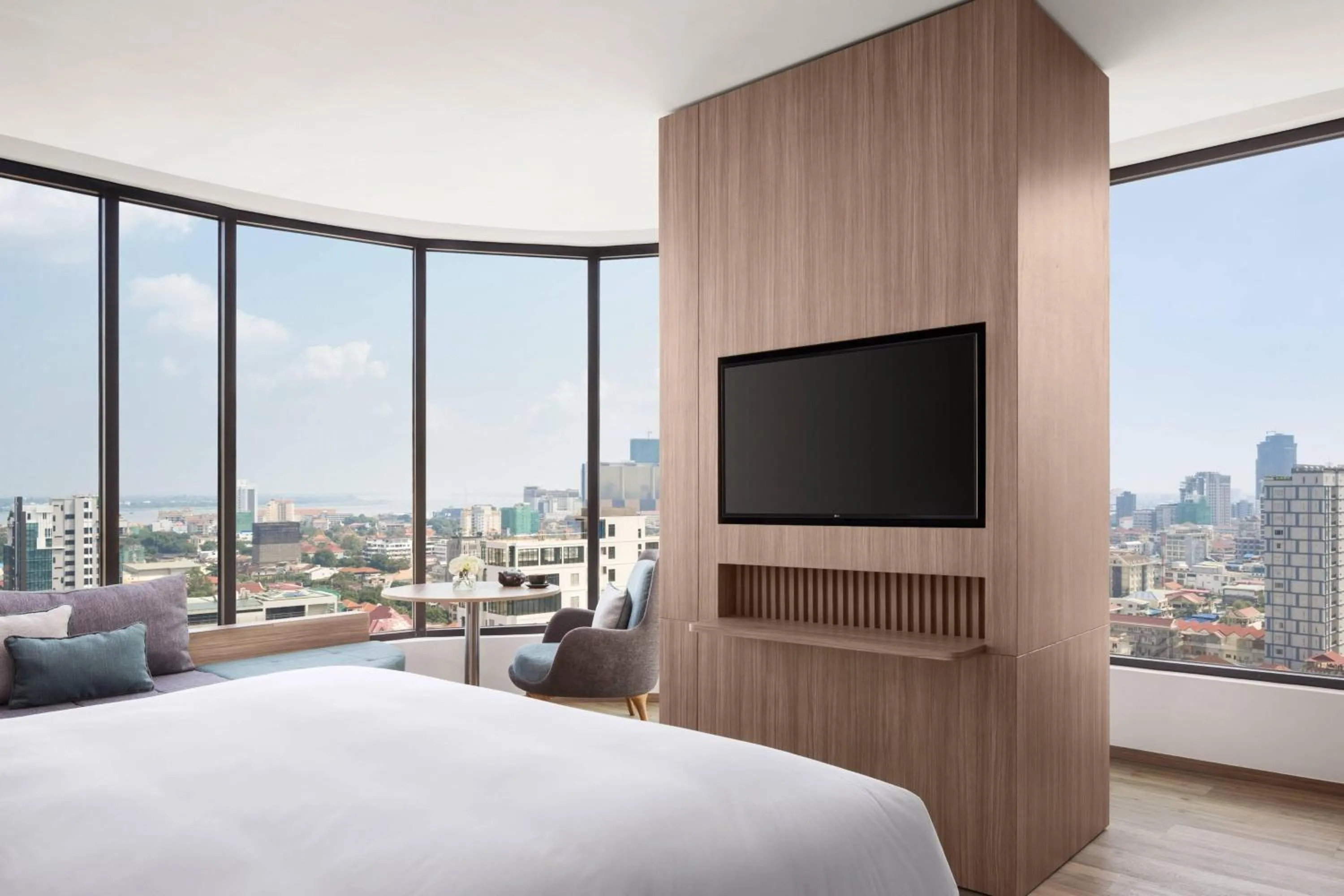 Living room, Bed in Courtyard by Marriott Phnom Penh