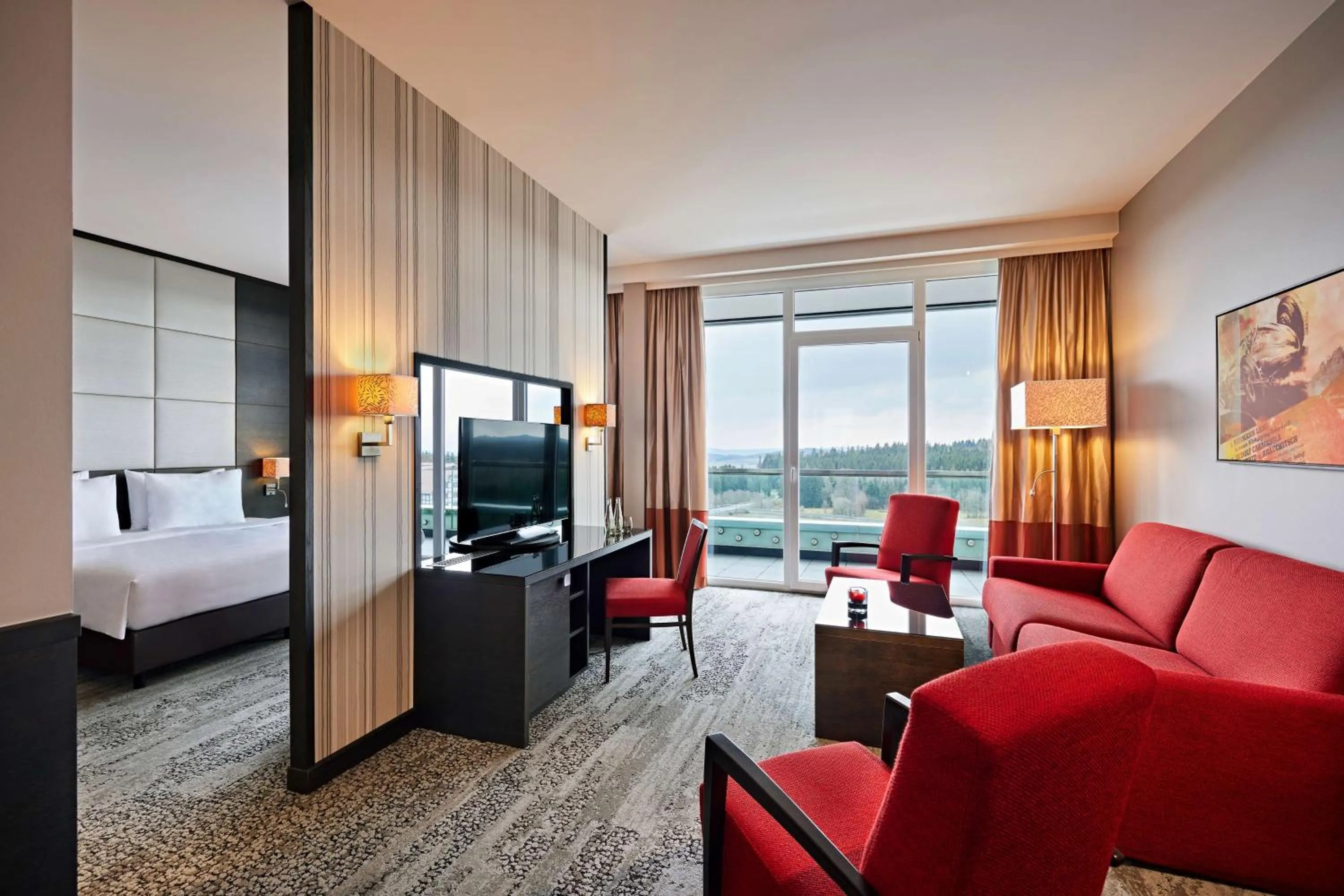 Photo of the whole room, Bed in Nürburgring Congress Hotel