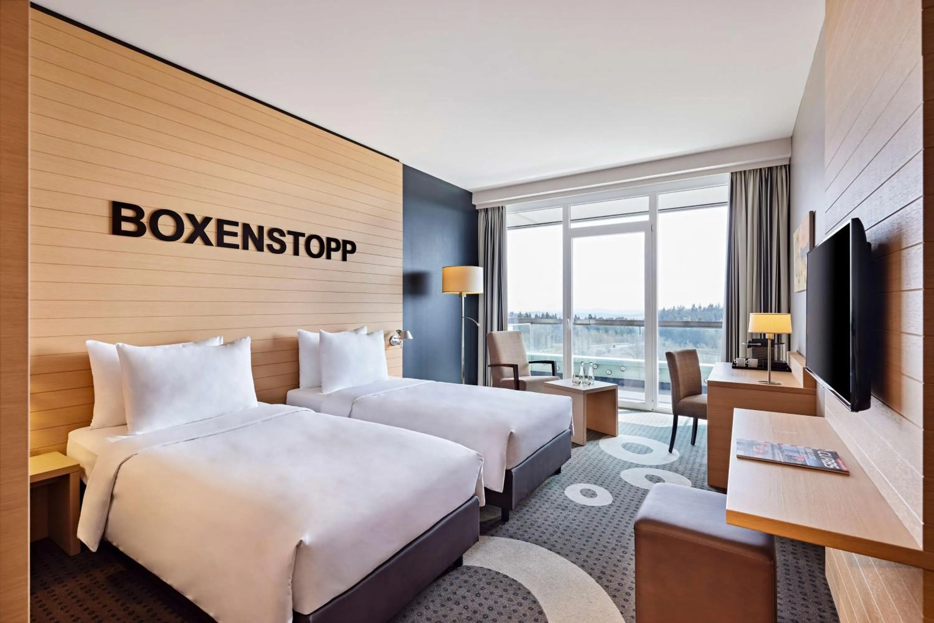 Photo of the whole room, Bed in Nürburgring Congress Hotel